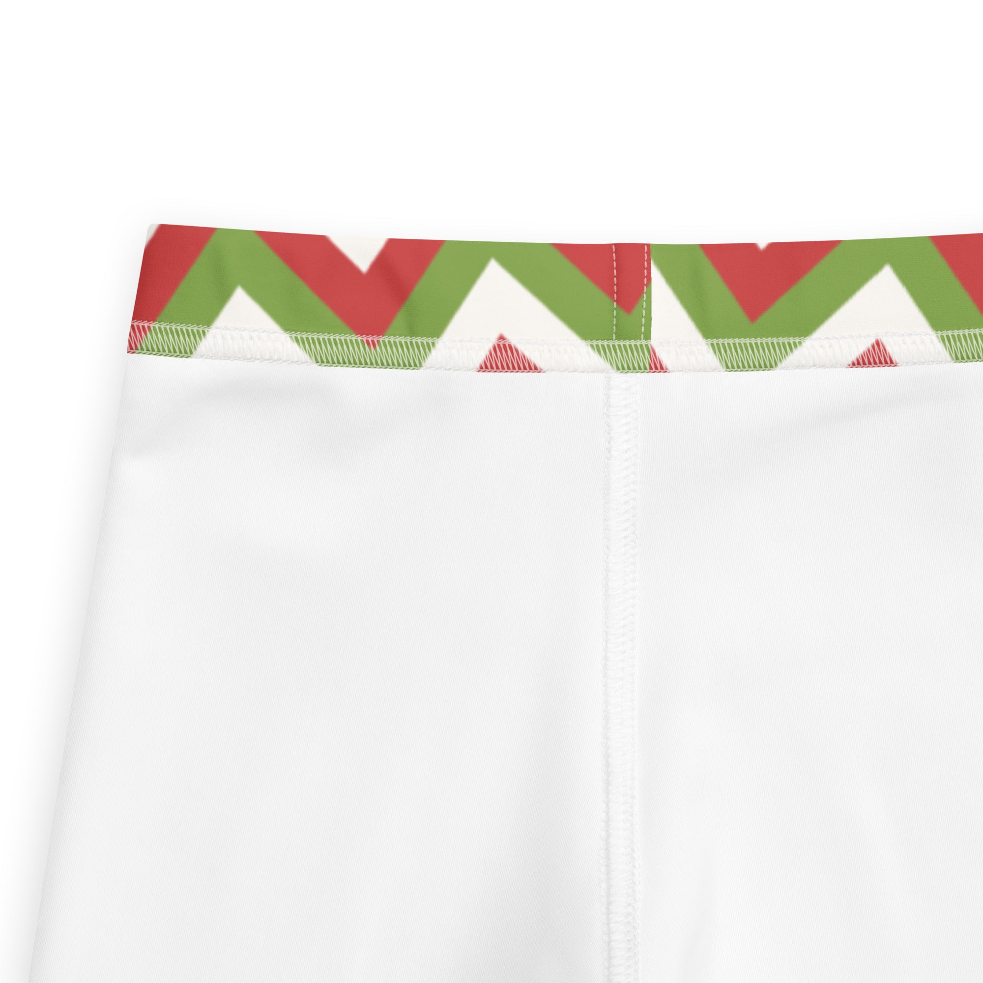 White kids christmas chevron buttery soft leggings with festive red and green zigzag waistband pattern
