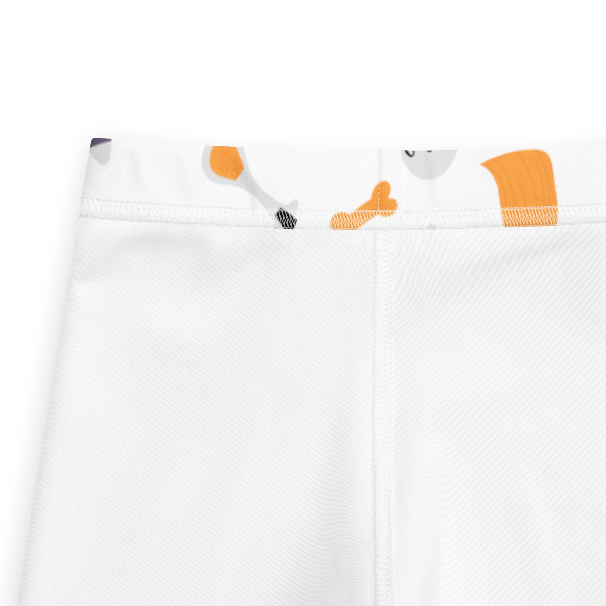 White shorts with a playful orange and gray paintbrush pattern on the waistband for girls ghost and pumpkin print leggings