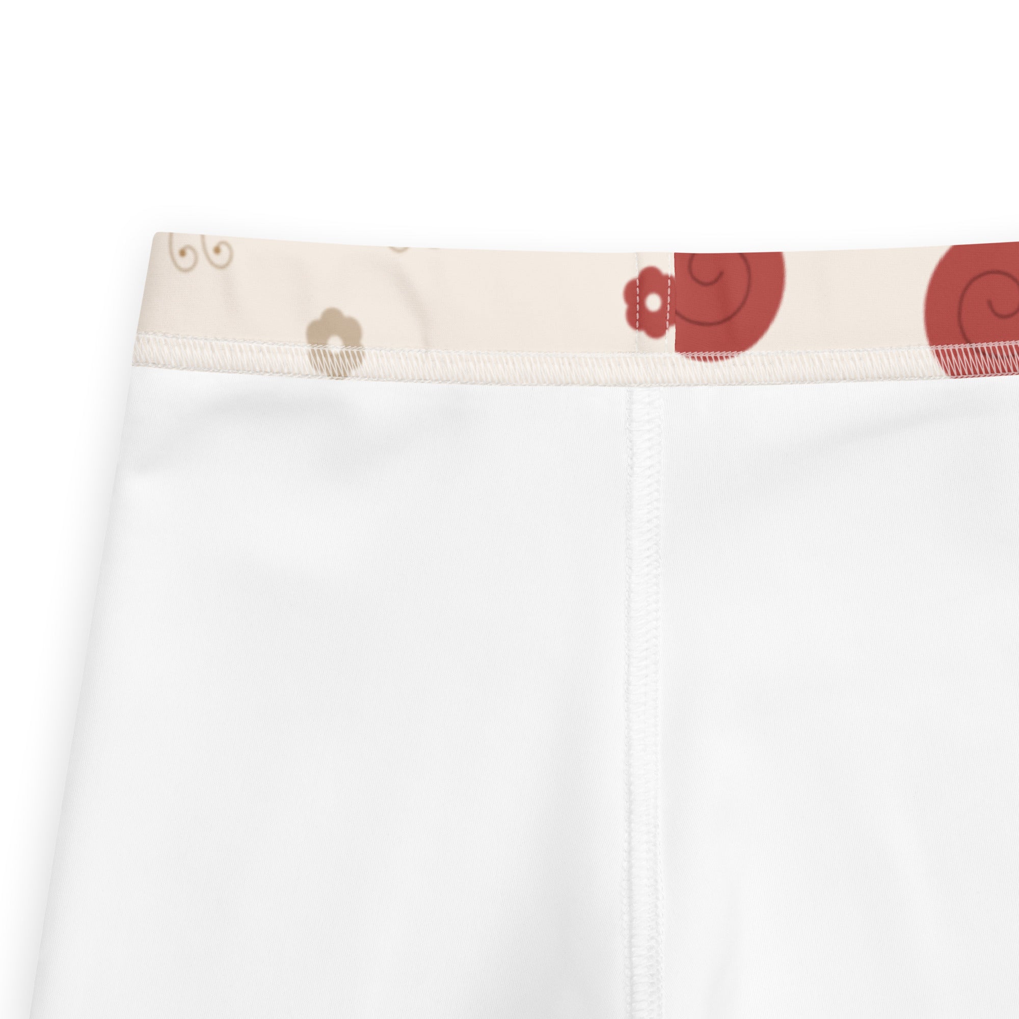 Girls red snail buttery soft white leggings with a decorative red and beige spiral pattern waistband