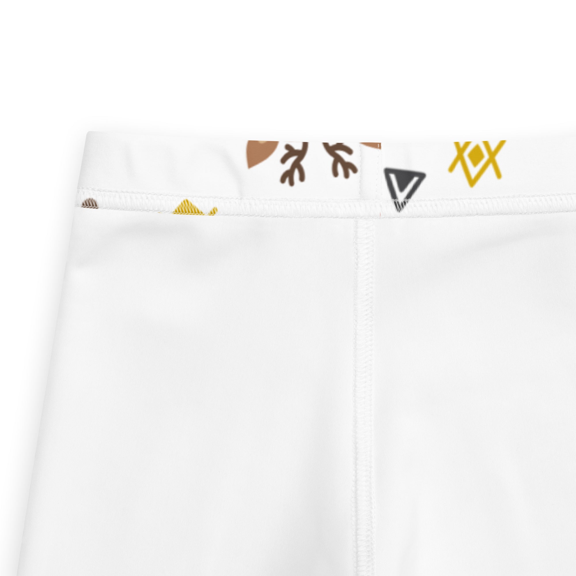 White kids reindeer buttery soft leggings with playful waistband featuring brown antler and yellow geometric patterns