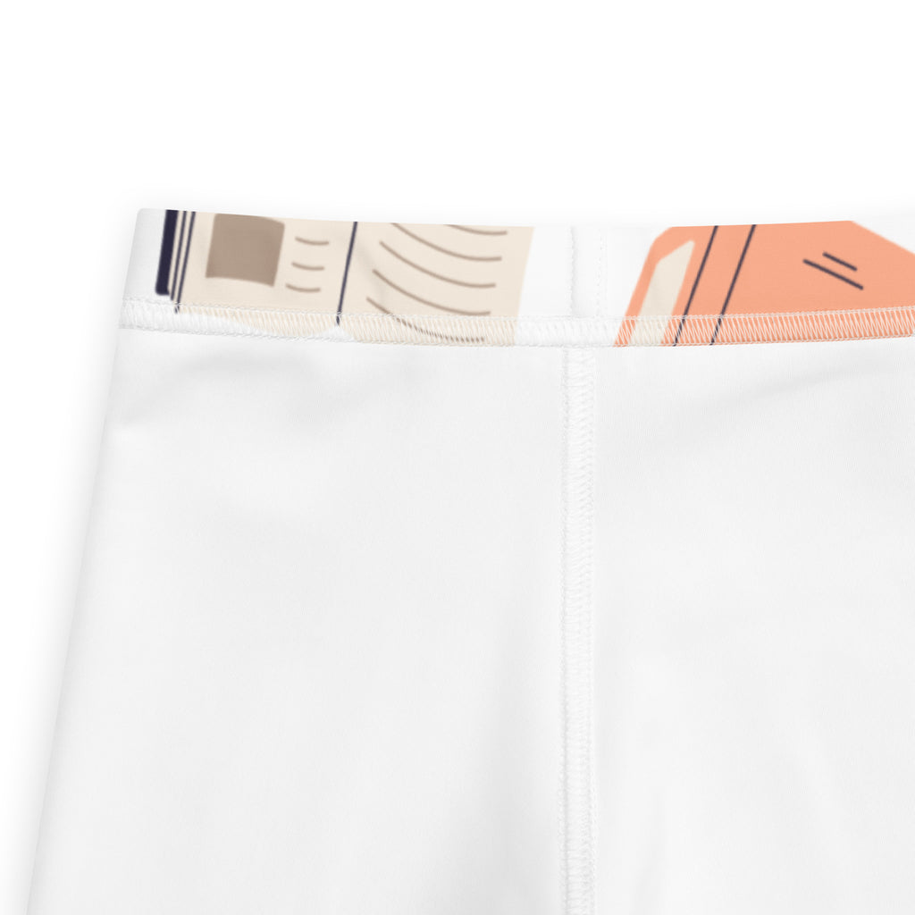 Kids book print buttery soft white athletic leggings with geometric beige orange and black waistband pattern