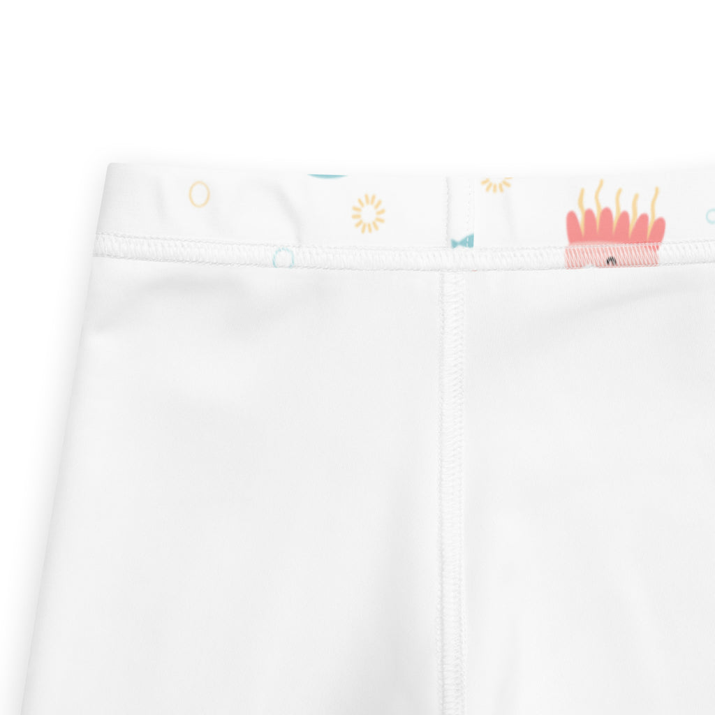 White girls ocean animal buttery soft leggings with colorful cartoon waistband featuring suns eyes and birthday cake