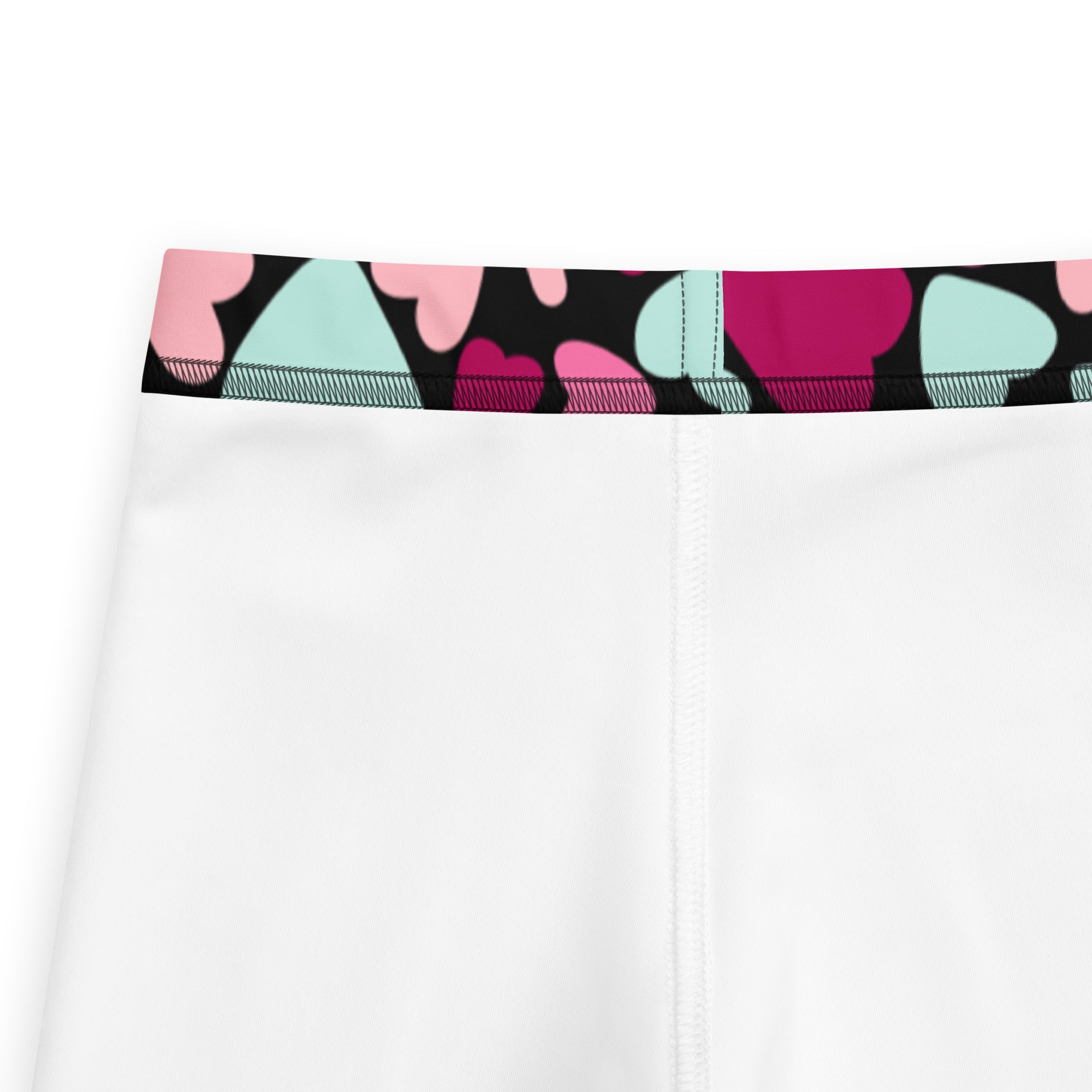 Girls multicolor heart buttery soft white leggings with a colorful heart-patterned waistband in pink magenta and mint green