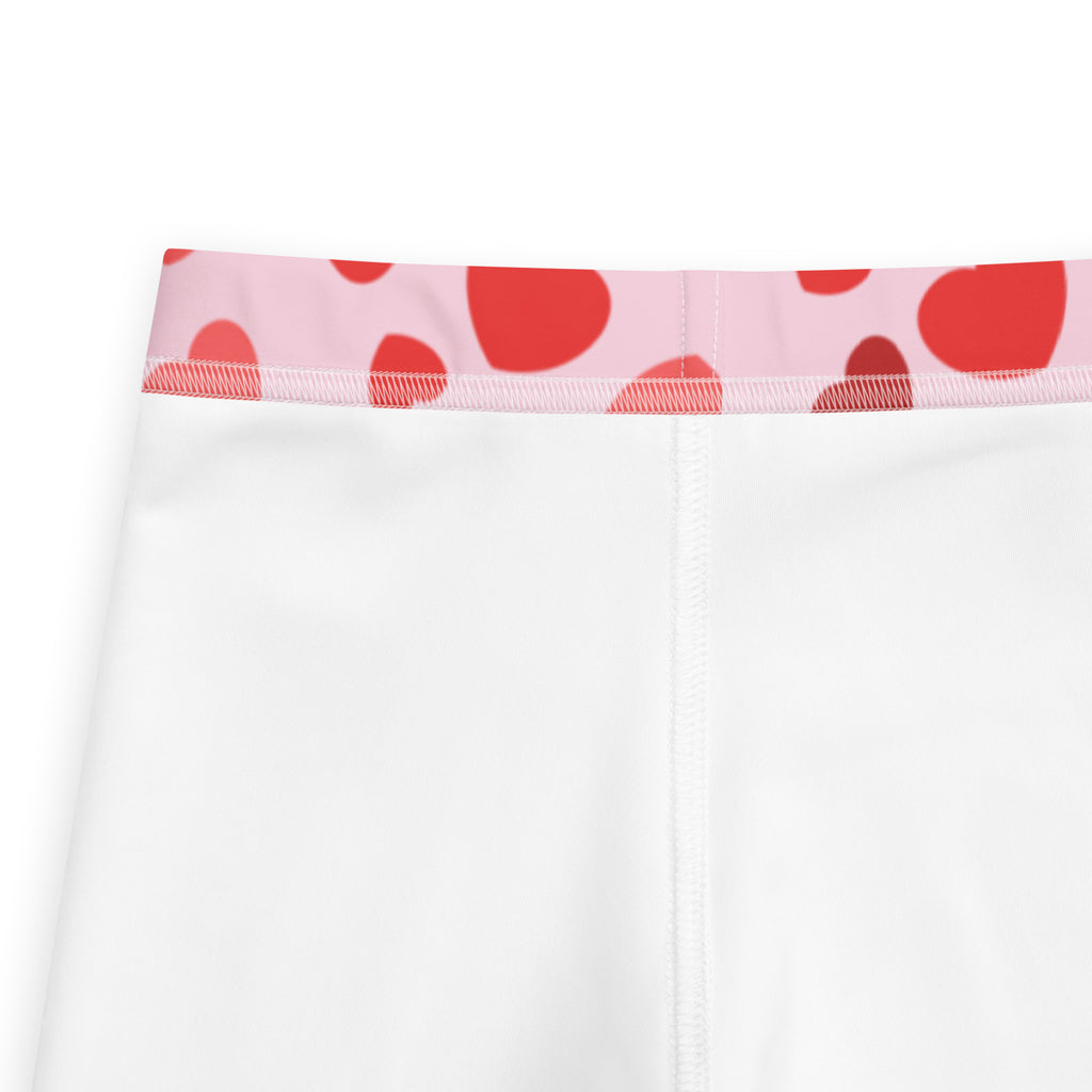 Girls valentine’s day white buttery soft leggings with pink waistband and red heart patterns on front side