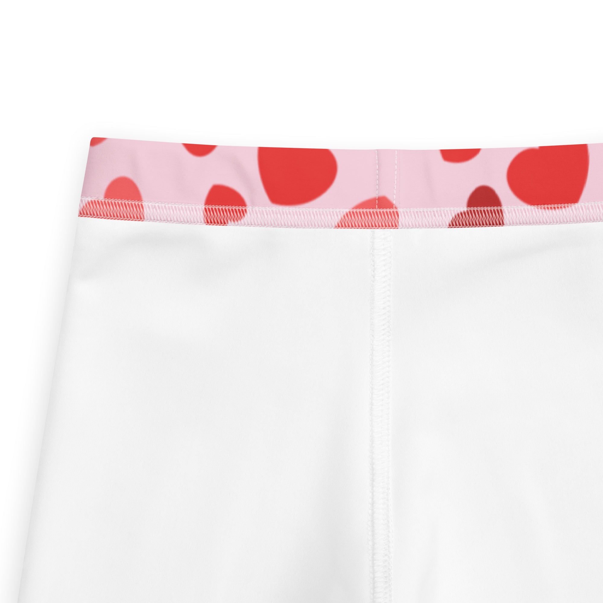 Girls valentine’s day white buttery soft leggings with pink waistband and red heart patterns on front side