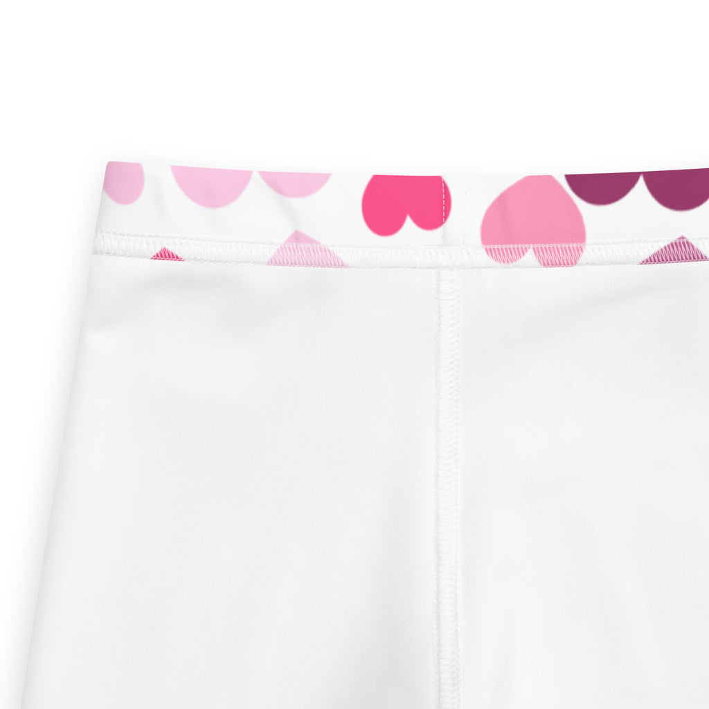 Girls purple and pink hearts buttery soft white leggings with a playful pink and magenta heart waistband