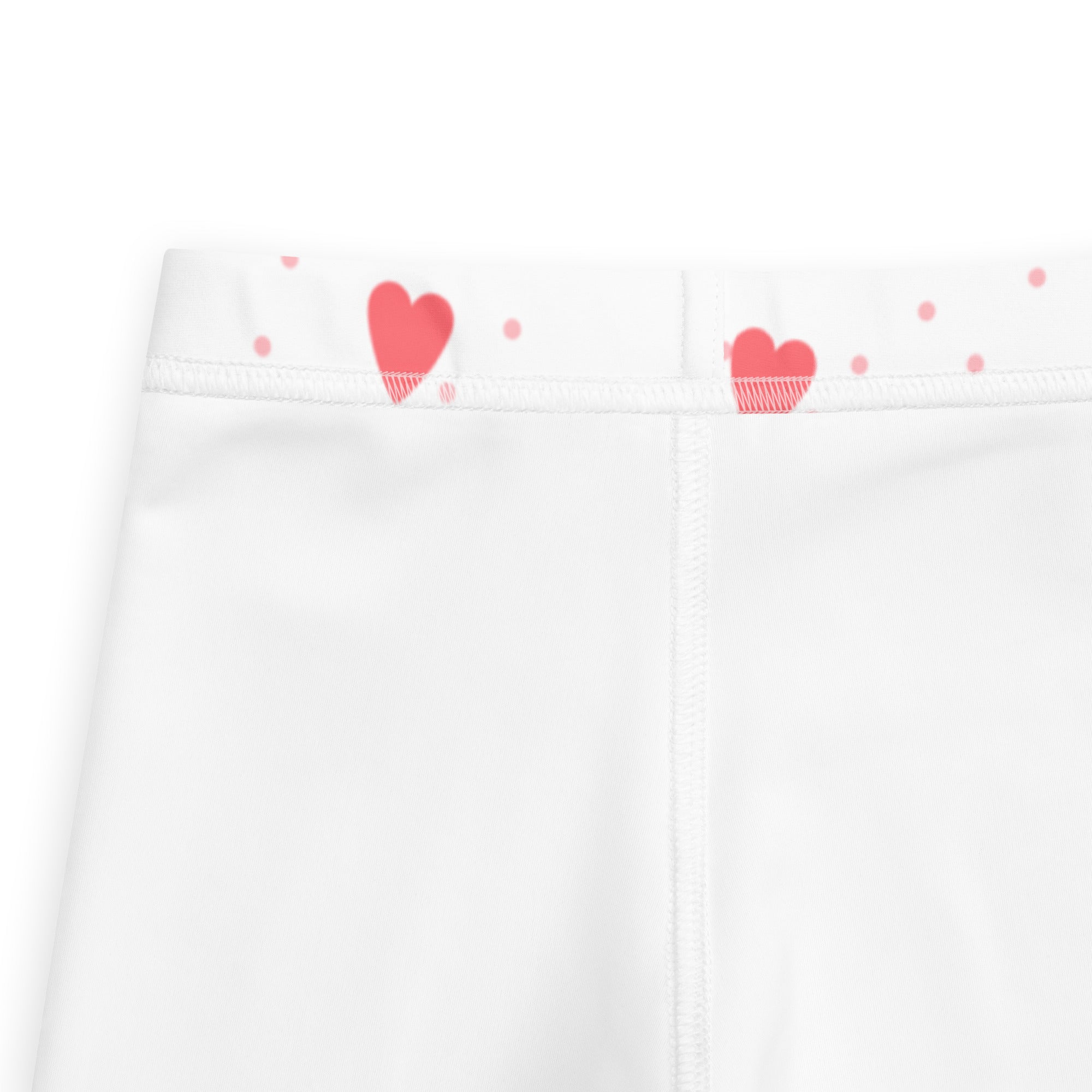 Girls scattered heart buttery soft white leggings with playful red hearts and pink polka dot waistband pattern