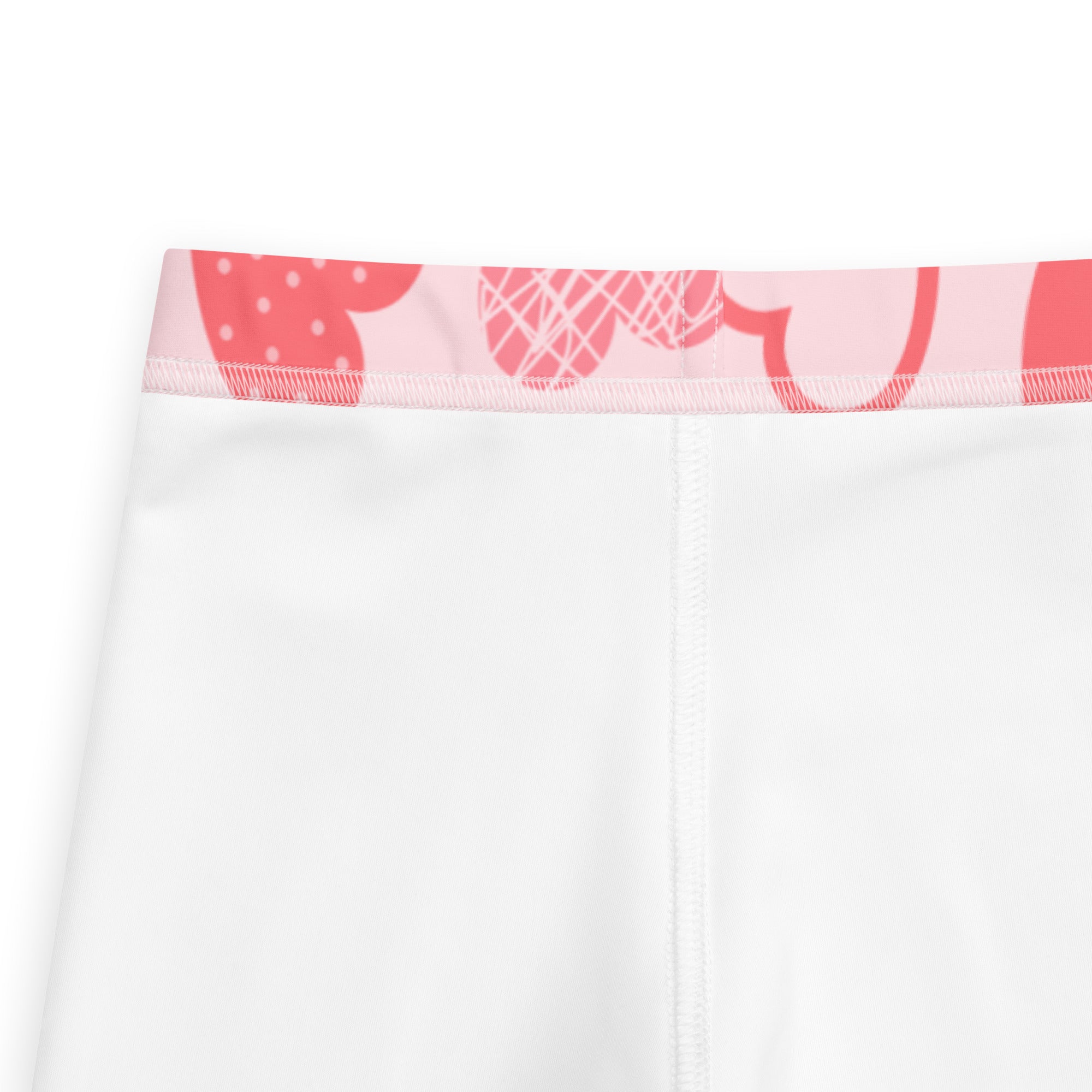 Girls pink heart pattern leggings with white fabric, pink waistband, red and white polka dot design, buttery soft material