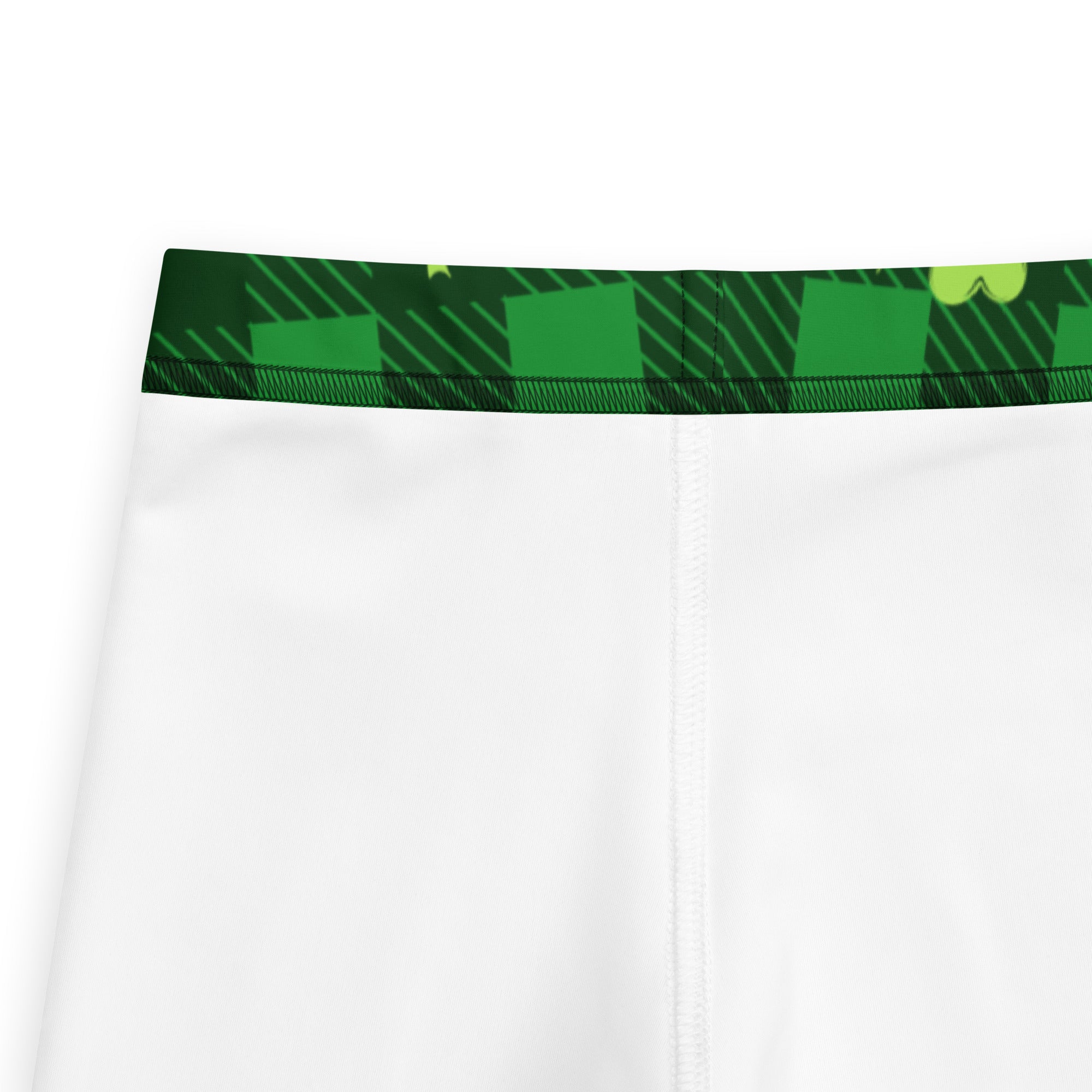 White girls leggings with green plaid shamrock waistband featuring geometric patterns and buttery soft fabric