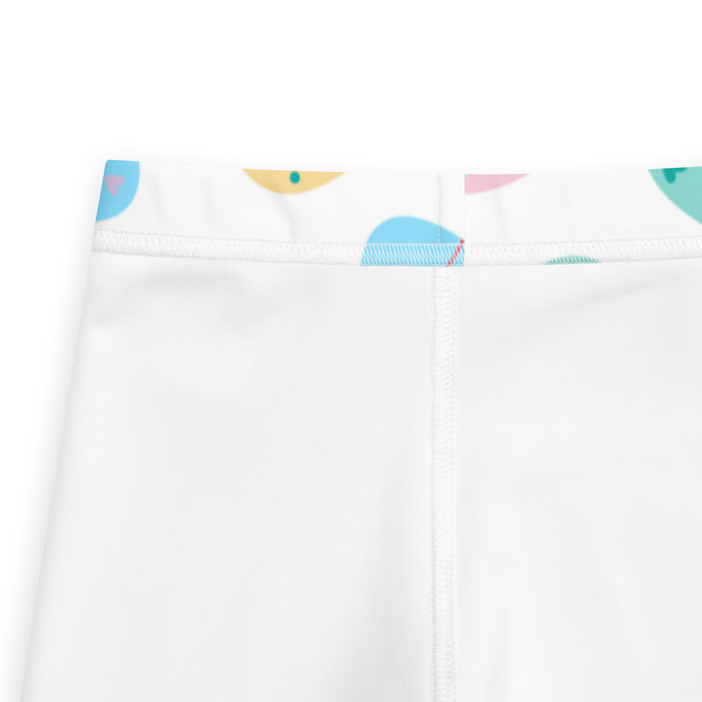Girls pastel easter egg buttery soft white leggings with playful colorful abstract waistband in pastel blue yellow and pink
