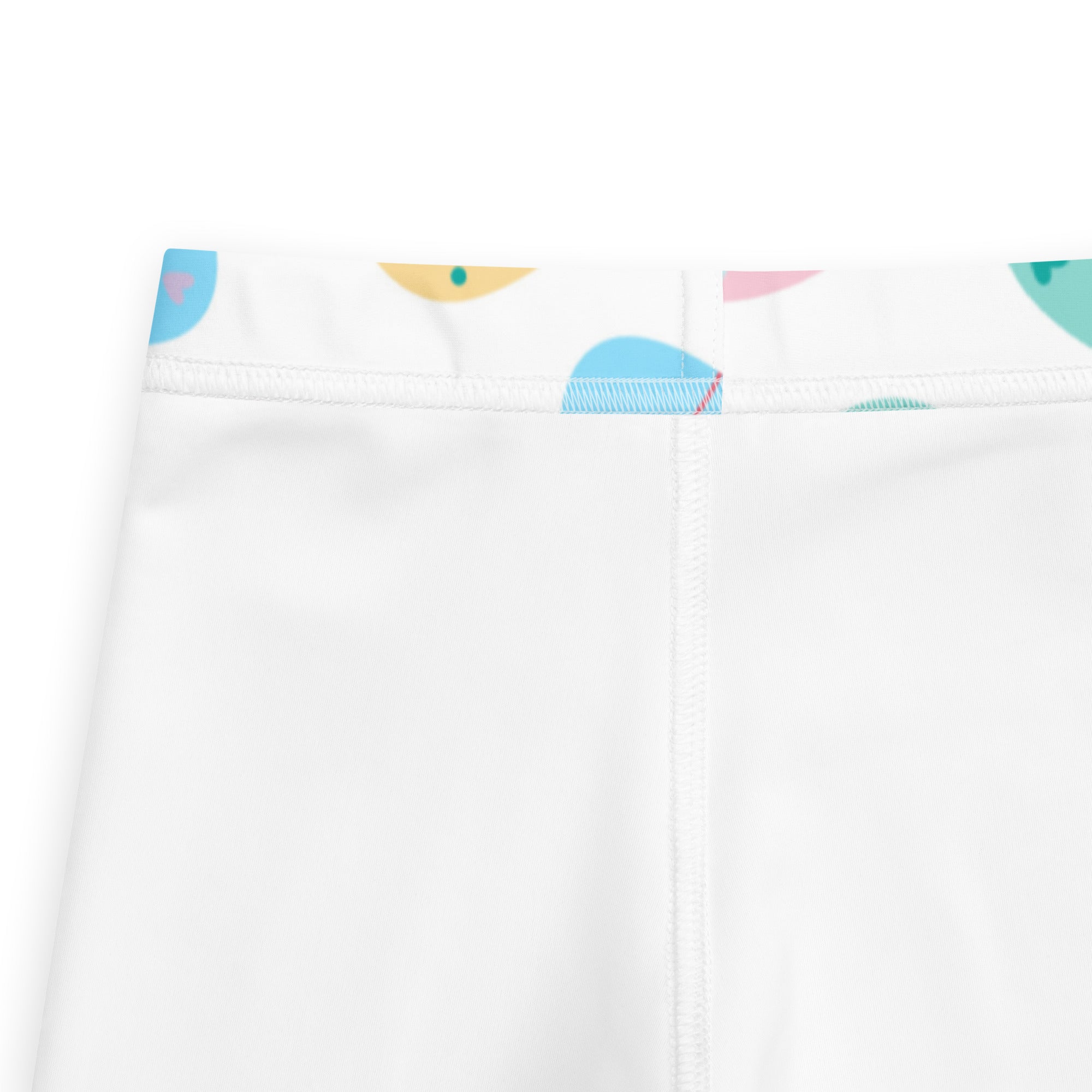 Girls pastel easter egg buttery soft white leggings with playful colorful abstract waistband in pastel blue yellow and pink
