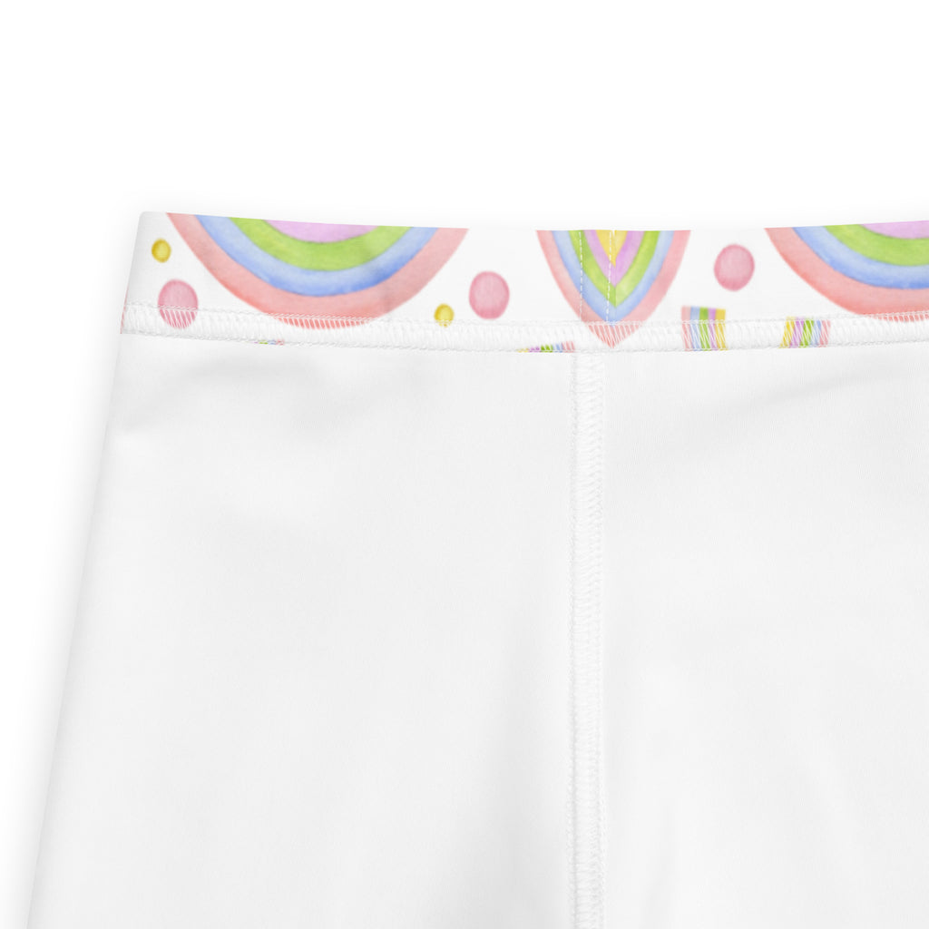 White kids leggings with colorful pastel rainbow and dot pattern on waistband made from buttery soft fabric