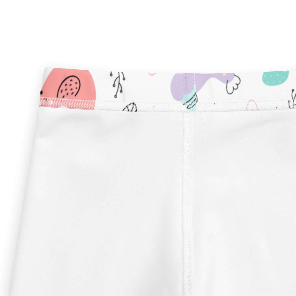 Girls pastel easter chick buttery soft white leggings with colorful cartoon waistband in pink purple and teal shapes