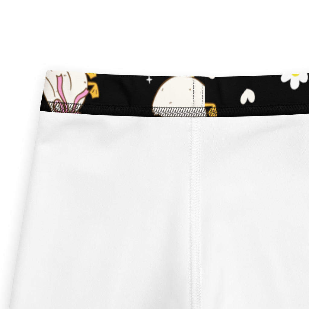Girls black easter duck buttery soft white leggings with black waistband and cartoon moon daisies and stars print