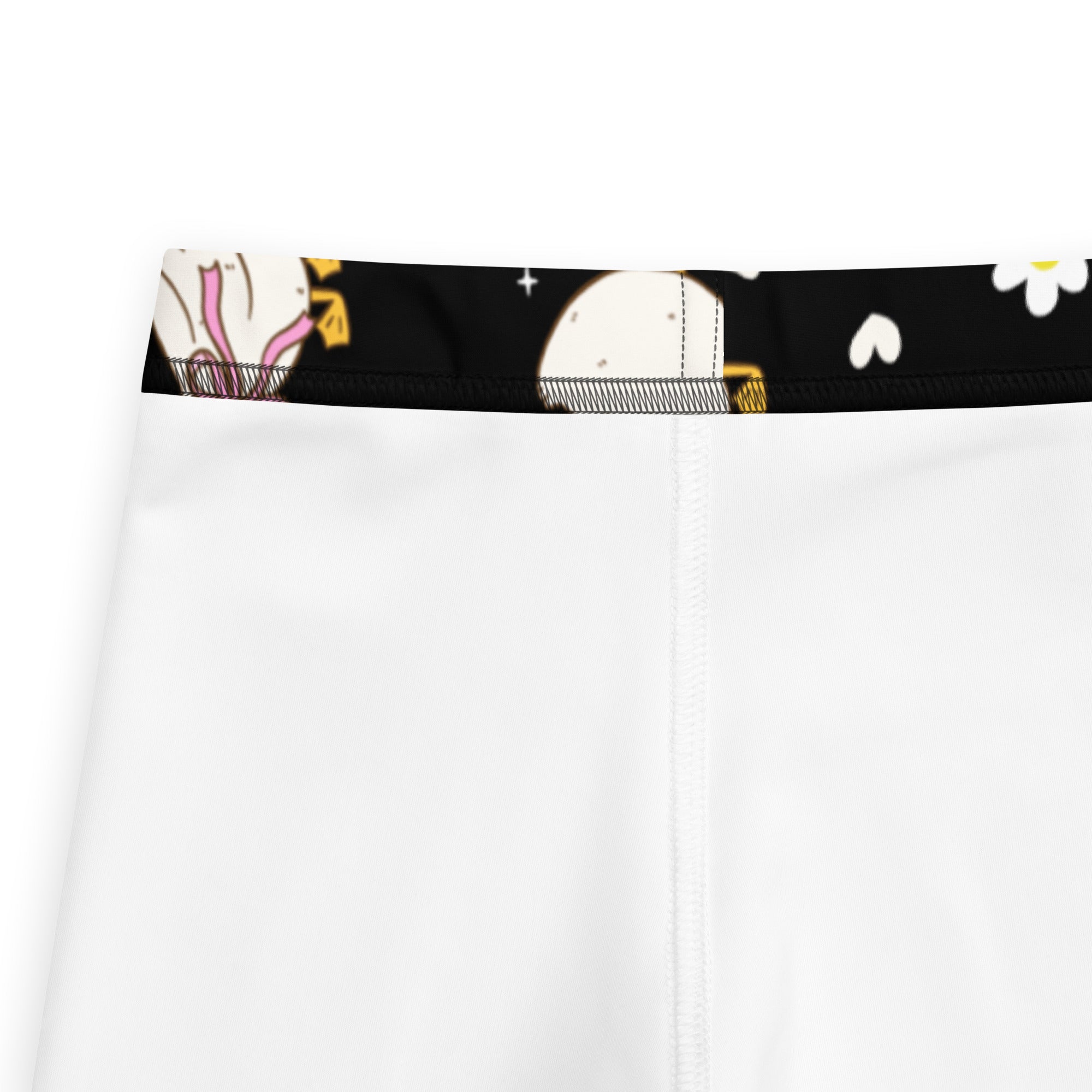Girls black easter duck buttery soft white leggings with black waistband and cartoon moon daisies and stars print