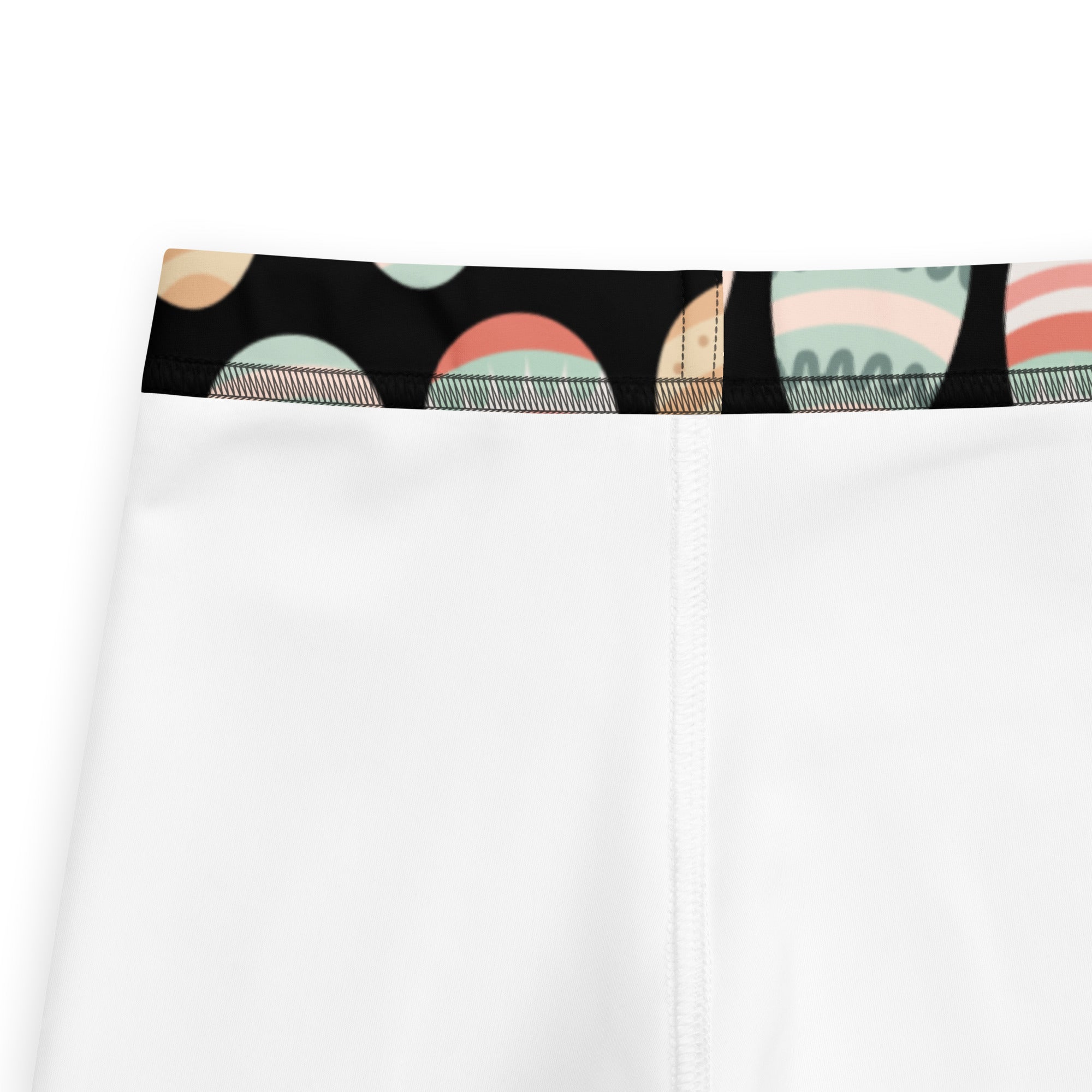 Girls black pastel easter egg buttery soft leggings with white athletic shorts and a colorful abstract waistband