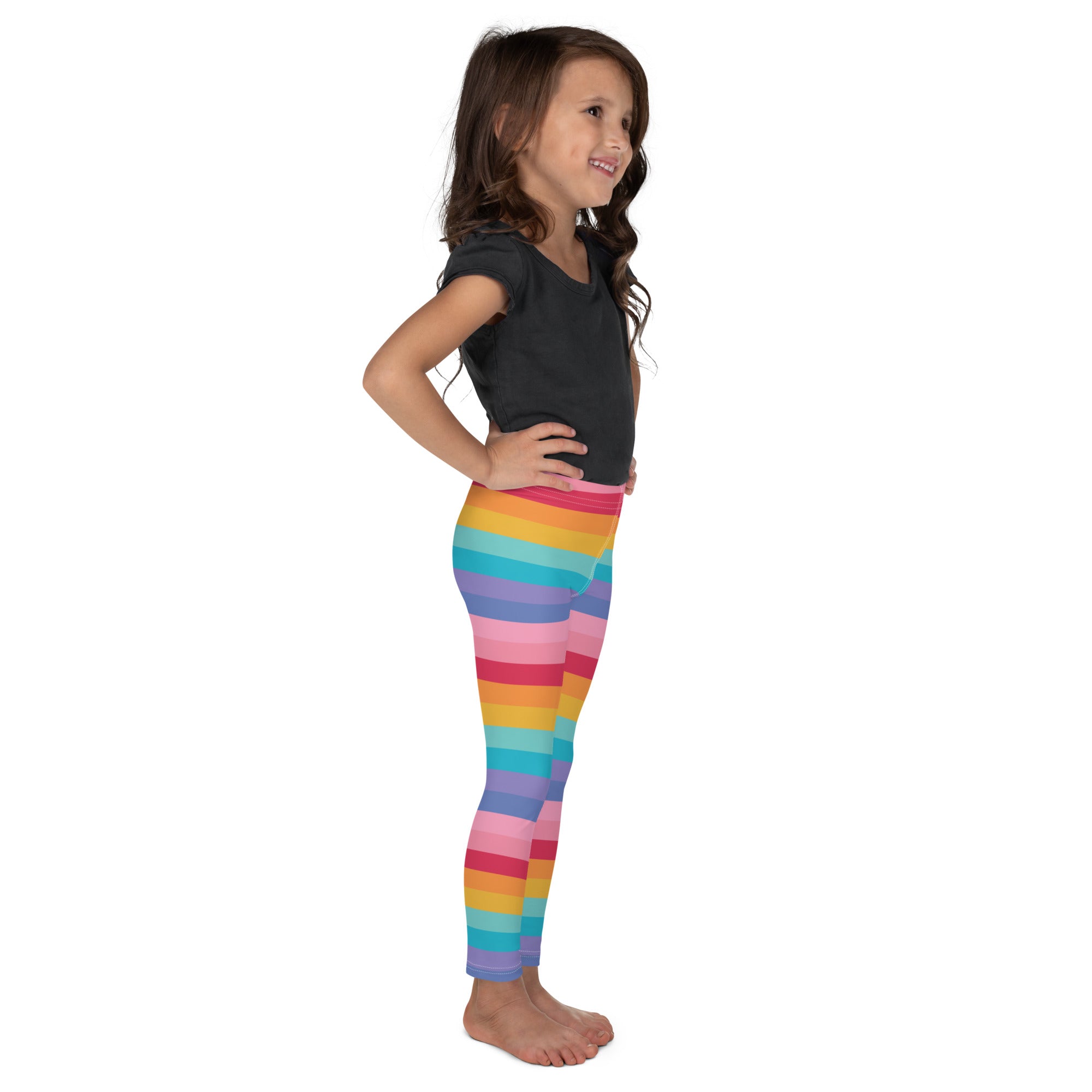 Girls bright rainbow striped buttery soft leggings with vibrant horizontal bands of pink orange yellow green blue purple