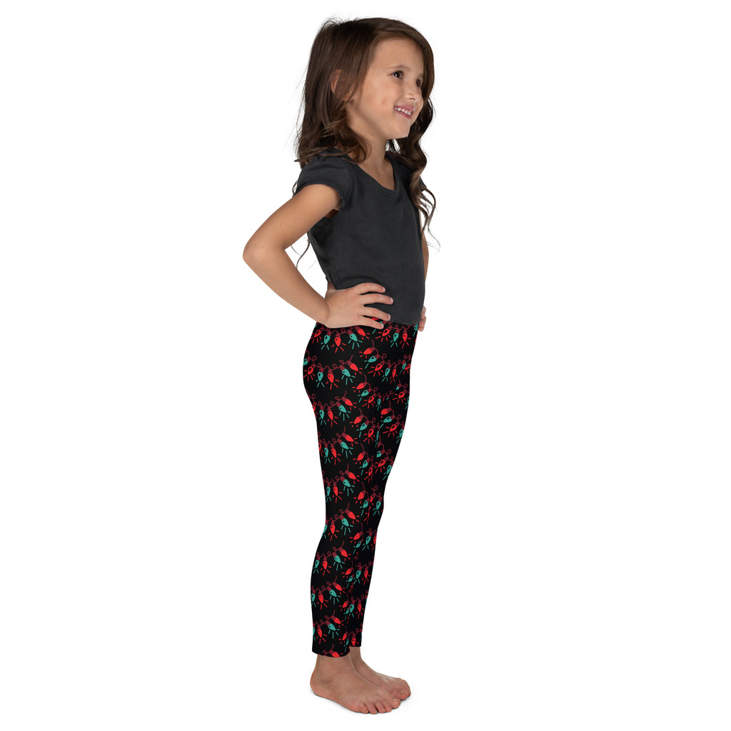 Black kids Christmas lights buttery soft leggings with playful red and teal flamingo pattern