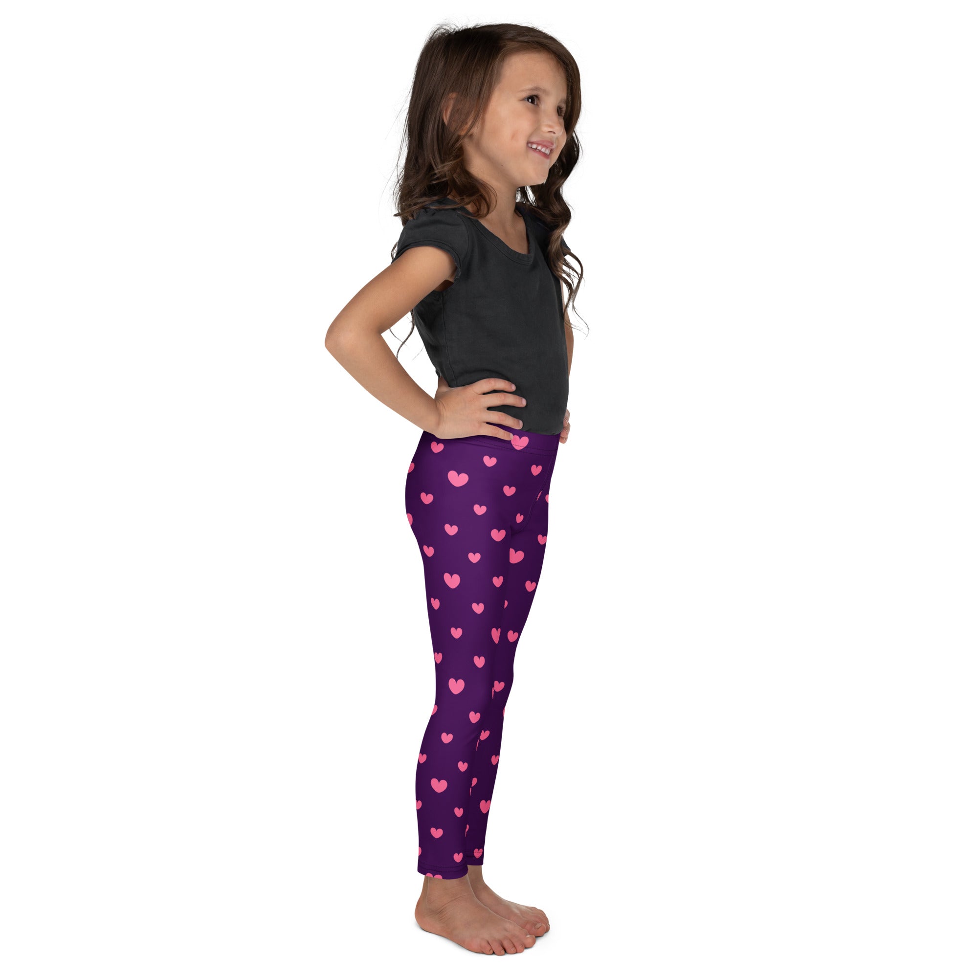 Girls purple heart leggings with a buttery soft fabric and pink heart pattern perfect for everyday wear