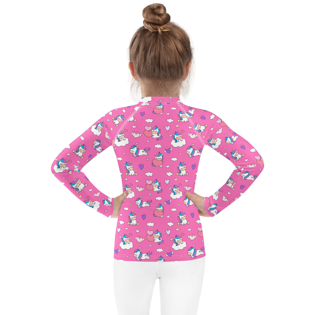 Pink girls long sleeve rash guard swim shirt with cartoon unicorns hearts clouds pattern and UPF 50+ sun protection