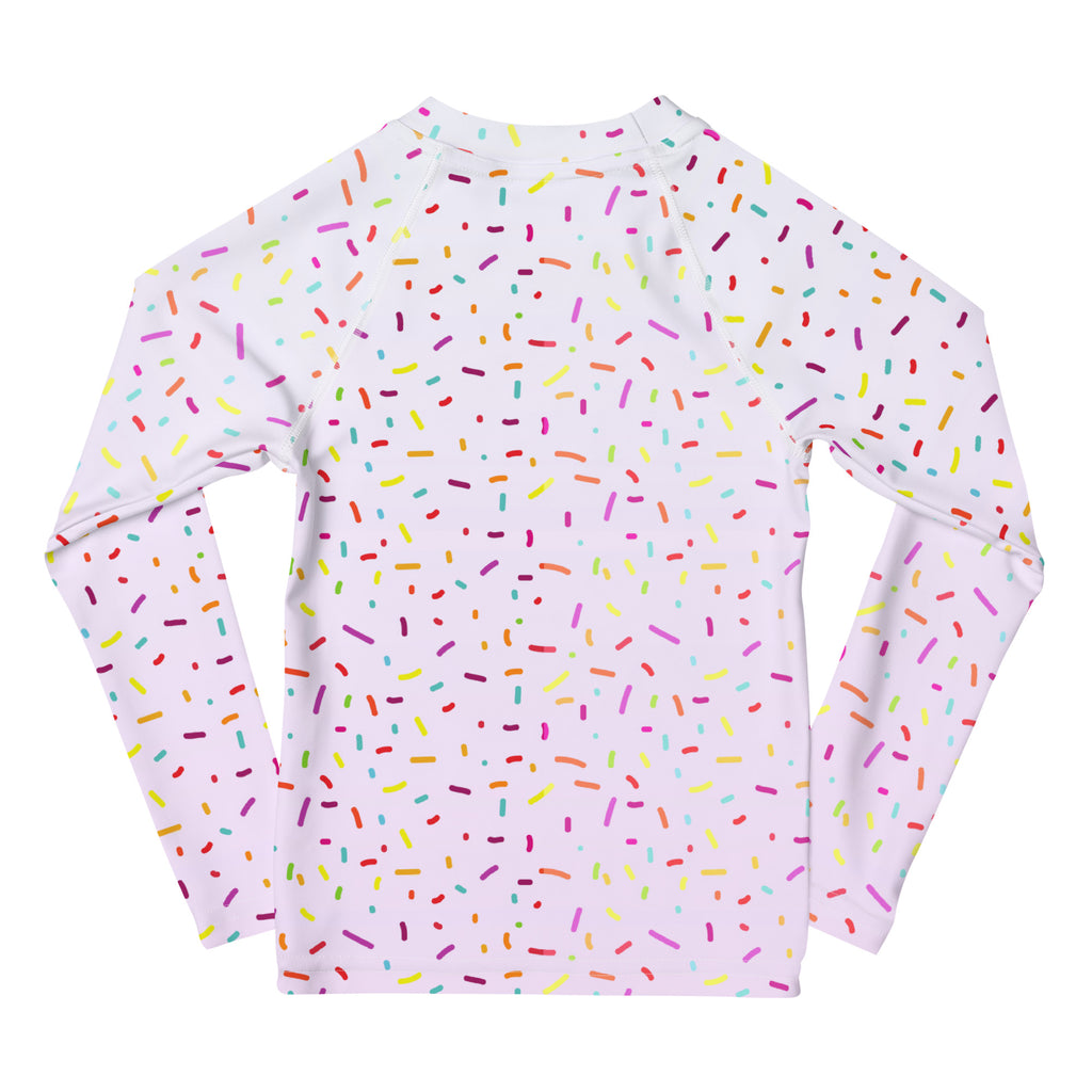 White long-sleeved girls rainbow sprinkles rash guard swim shirt with upf 50 plus multicolored sprinkle pattern