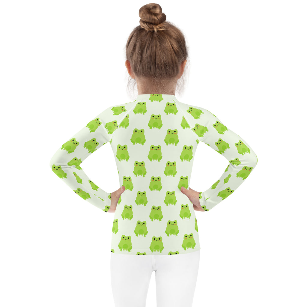 Kids green frog long sleeve rash guard swim shirt with upf 50 plus featuring a soft white base and light green frog pattern