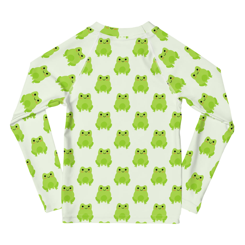 Kids green frog long sleeve rash guard swim shirt with UPF 50 plus featuring bright green cartoon frogs on off-white