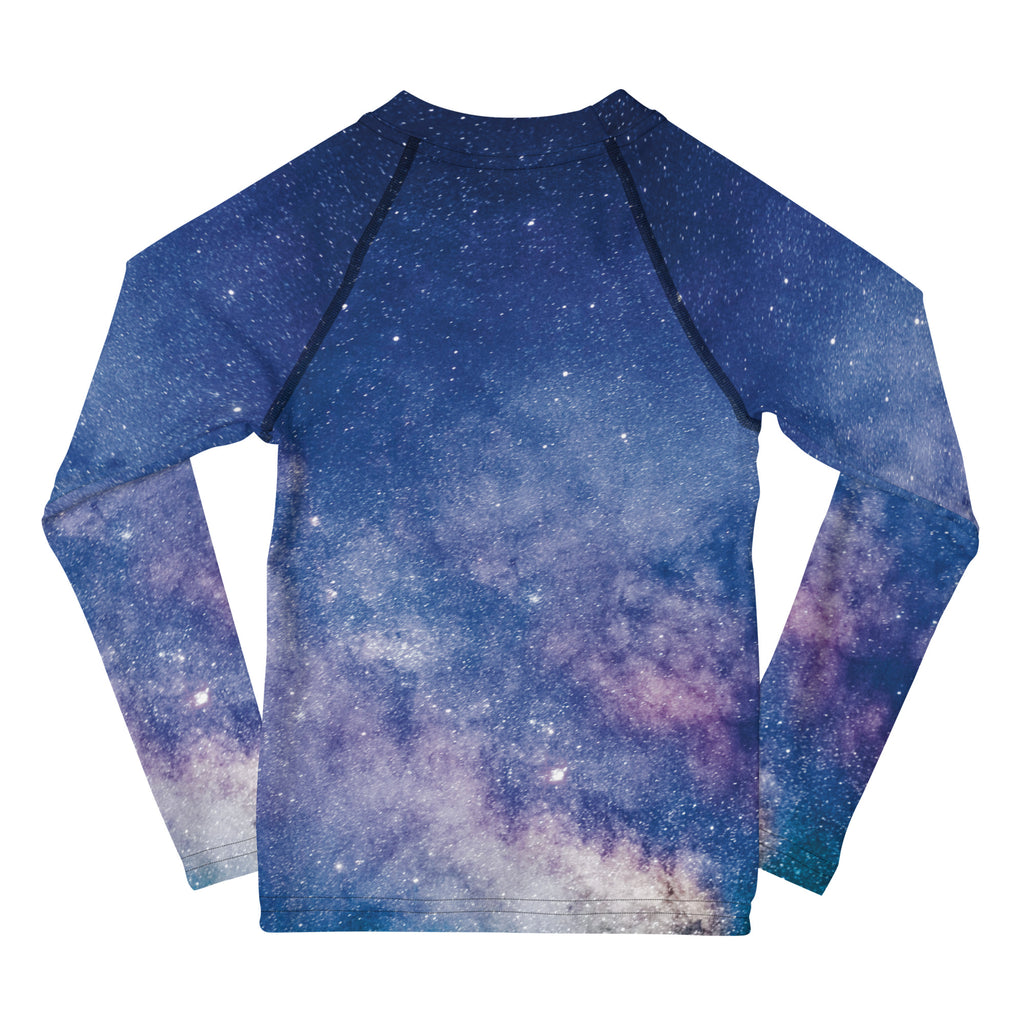 Girls long sleeve rash guard with vibrant galaxy print in deep blue purple and white featuring upf 50 plus sun protection