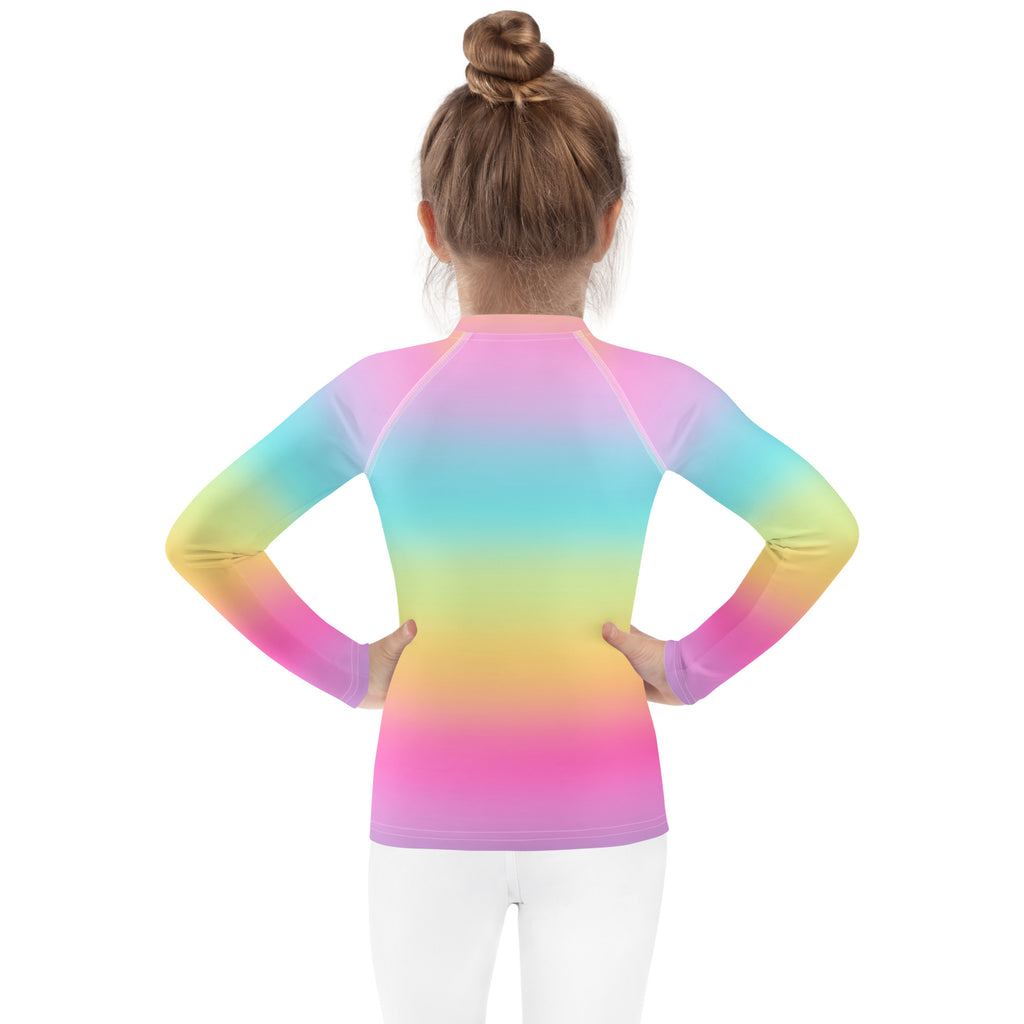 Girls bright rainbow long-sleeved rash guard with smooth stretchy fabric and UPF 50 plus for birthday swimwear