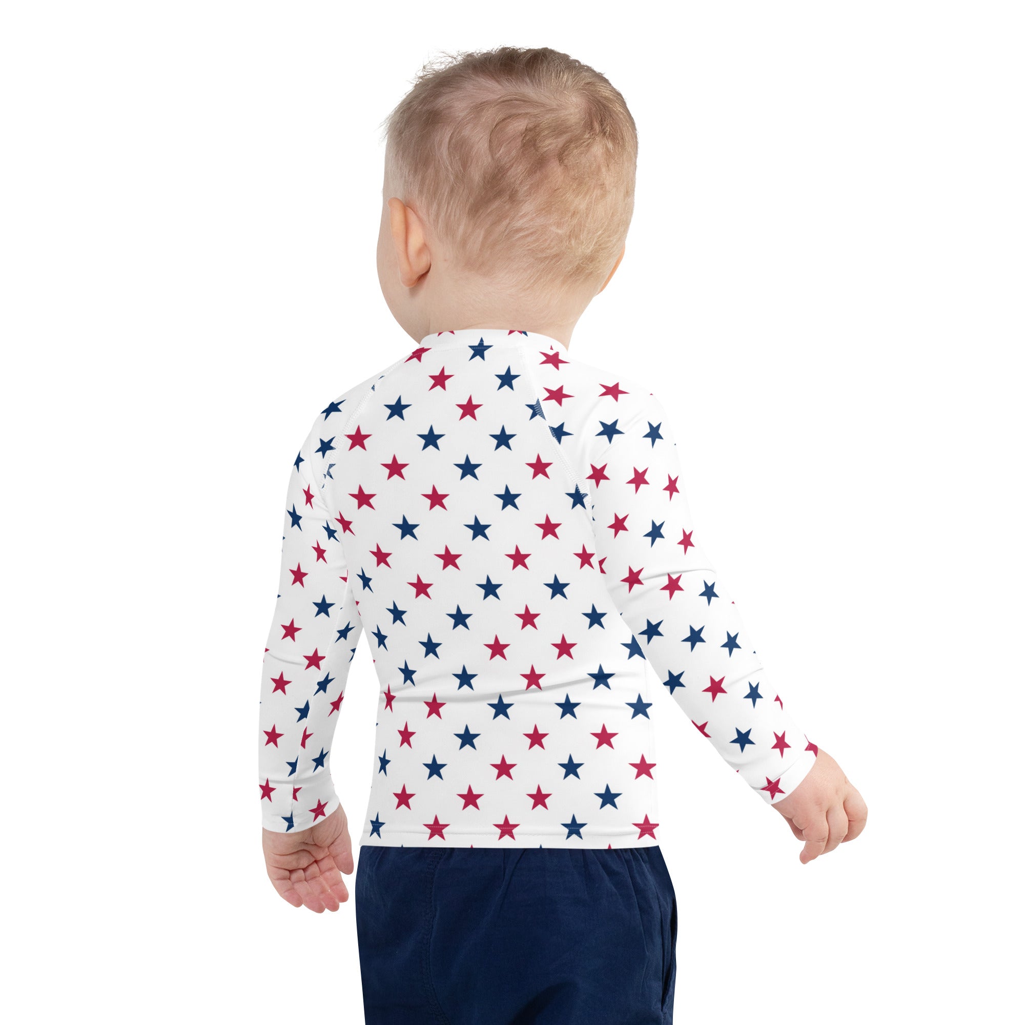 White long-sleeved baby rash guard swim shirt with red and blue stars pattern and upf 50 plus protection