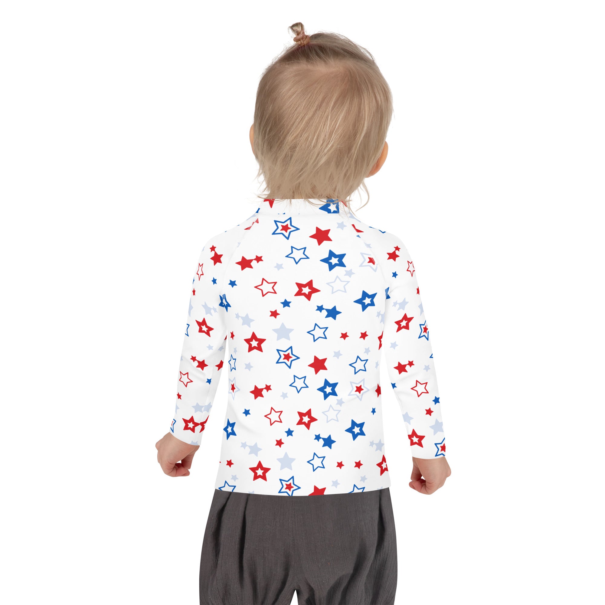 A child wearing a kids red white and blue stars usa long sleeve rash guard swim shirt with upf 50 plus