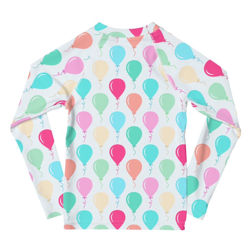 White long sleeve rash guard with colorful birthday balloons pattern and upf 50 plus for kids swimwear