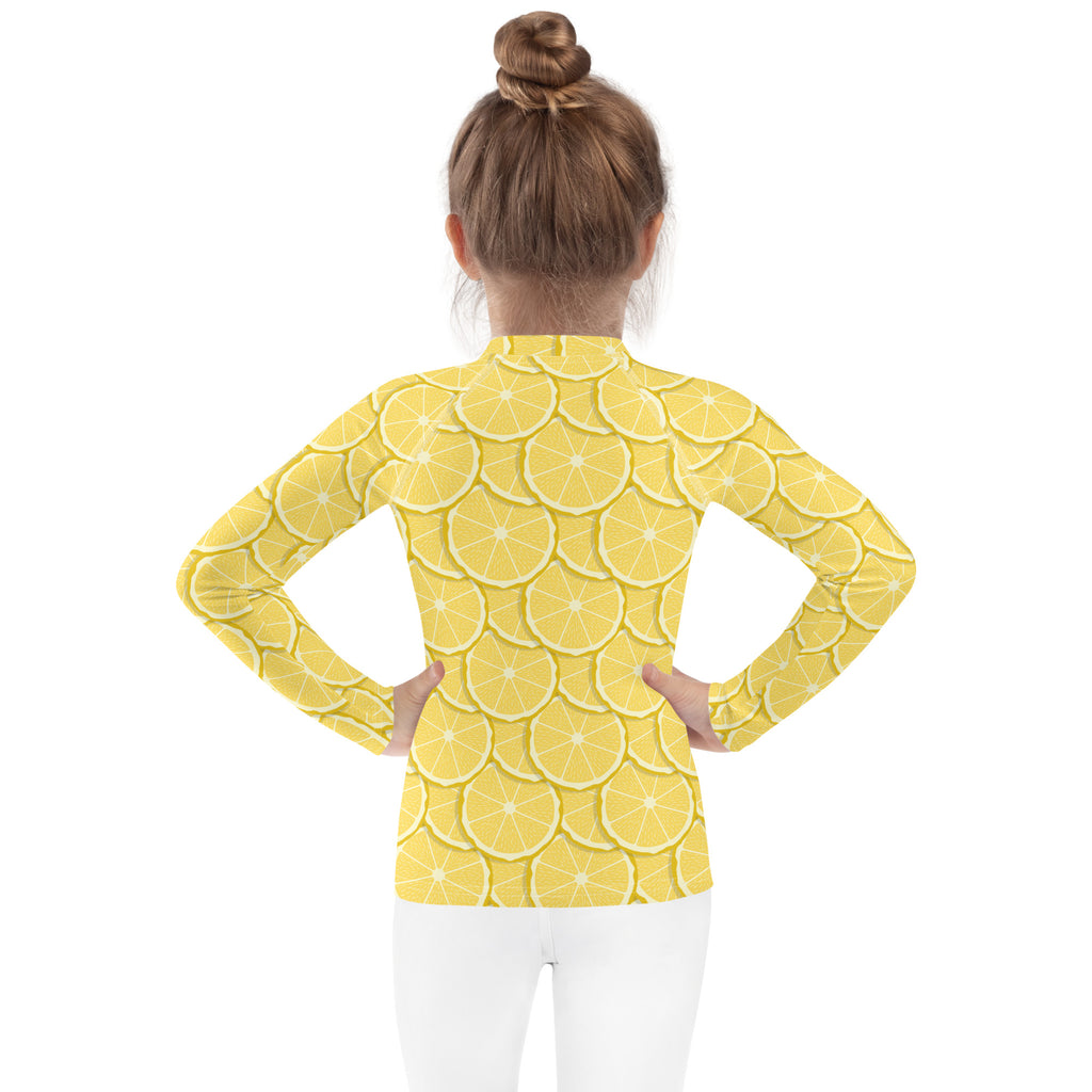 Kids lemon long sleeve rash guard swim shirt in yellow with sliced lemon pattern and upf 50 plus sun protection