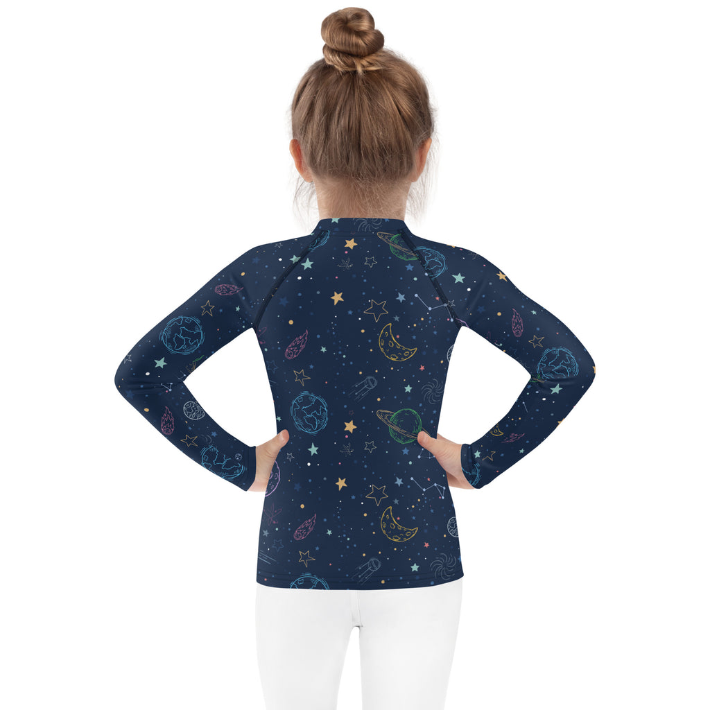 Navy blue kids galaxy long sleeve rash guard swim shirt with playful pastel space pattern and upf 50 plus protection