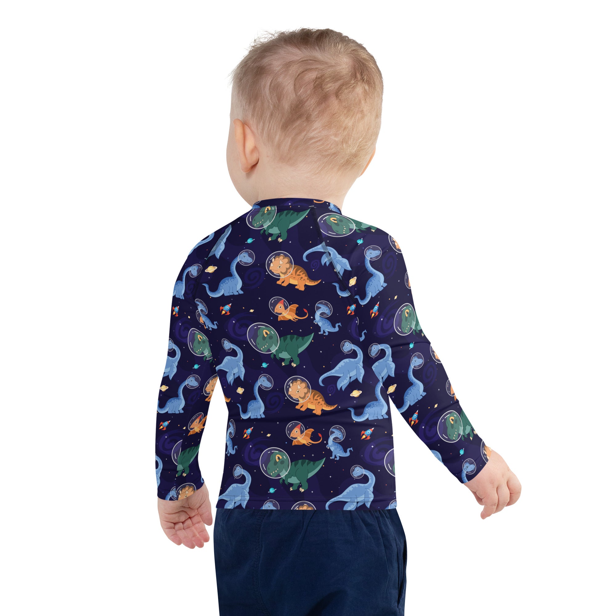 Kids dinosaurs in space navy blue long sleeve rash guard swim shirt with upf 50 plus featuring cartoon dinosaur bubbles