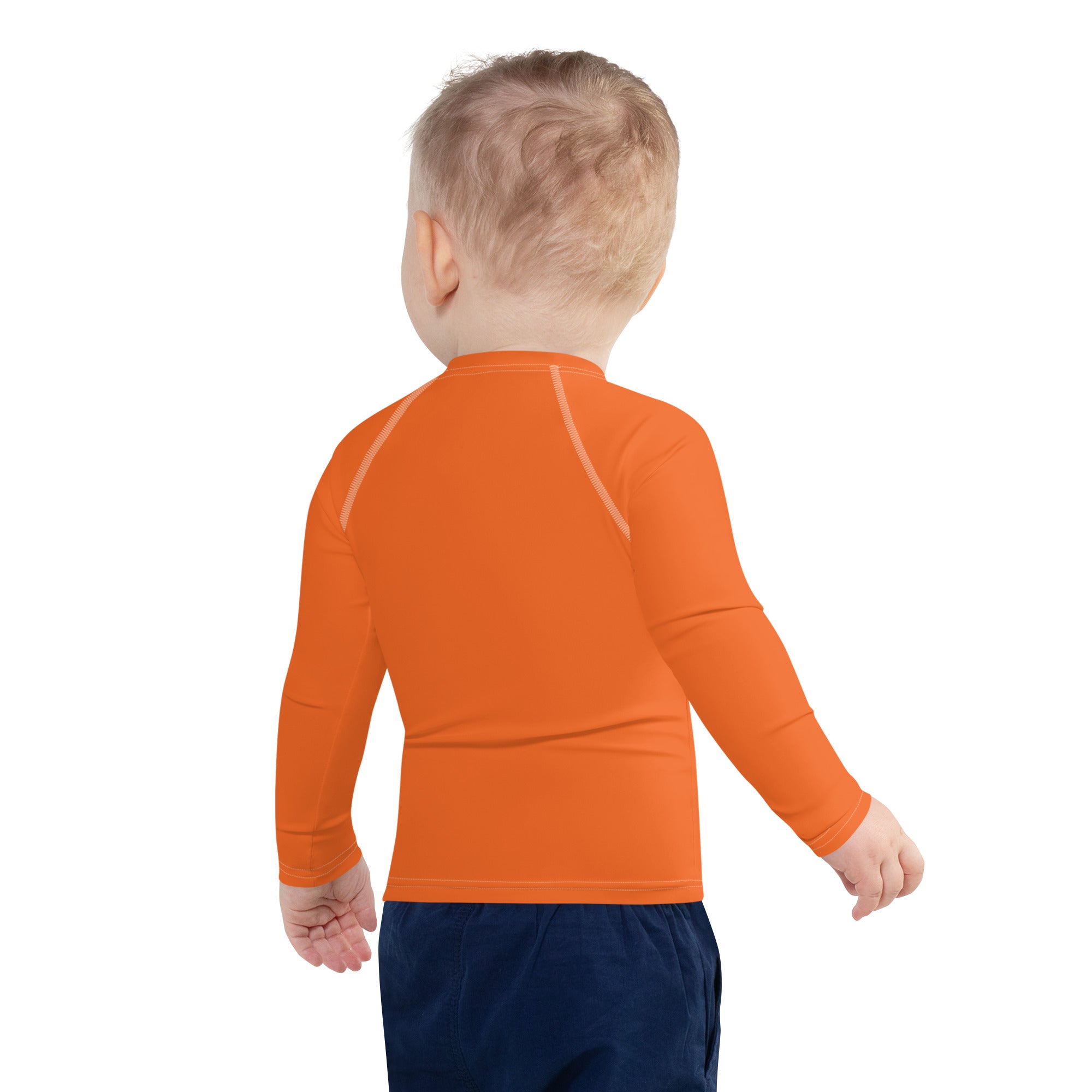 Kids orange long sleeve rash guard swim shirt with upf 50 plus featuring subtle white seam detailing