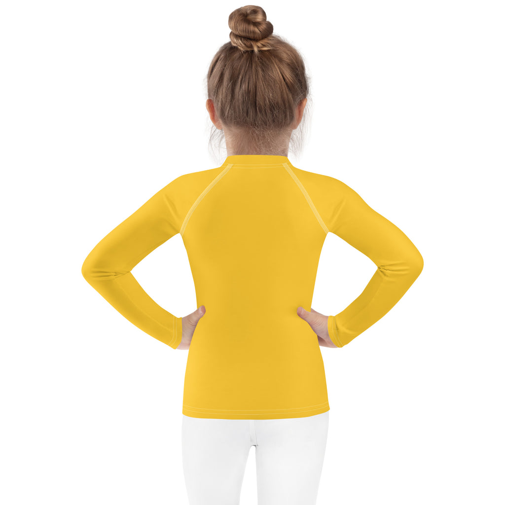 Kids yellow long sleeve rash guard swim shirt with UPF 50 plus made of seamless raglan sleeves and high collar