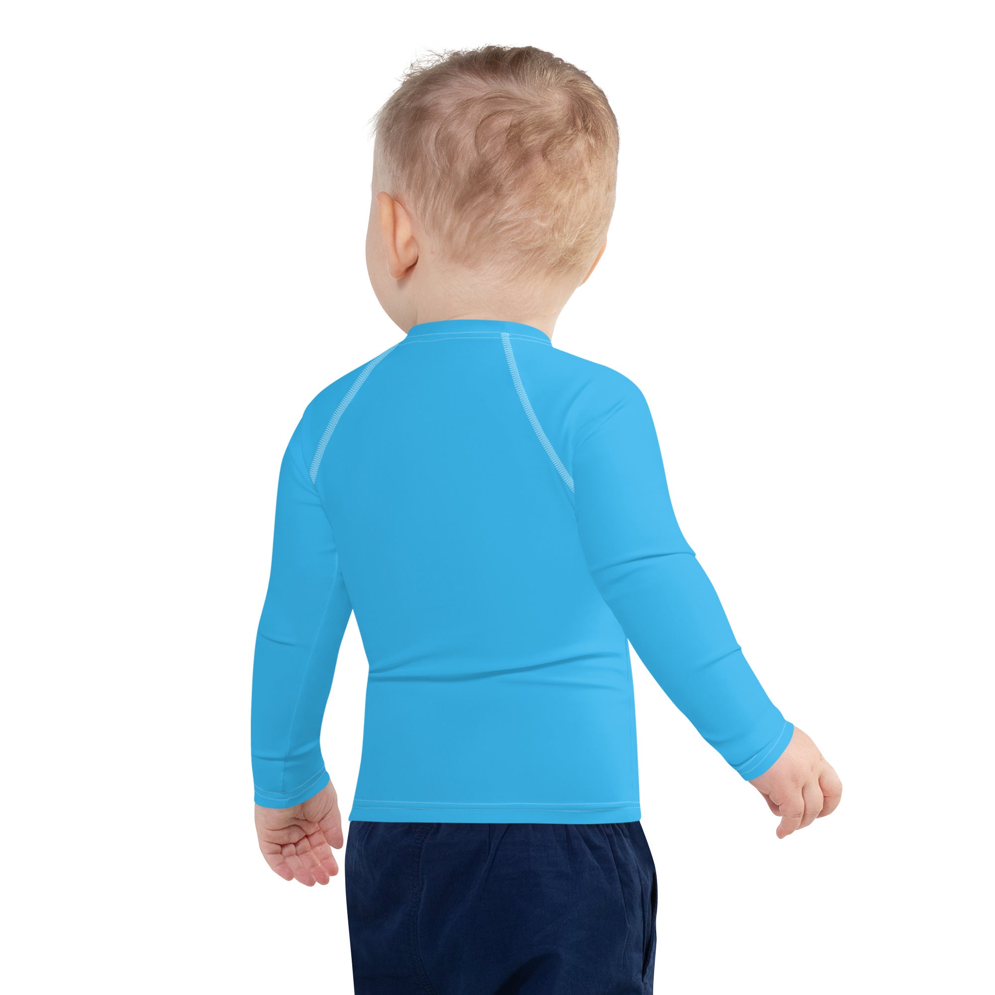 Kids sky blue long sleeve rash guard swim shirt with subtle white seams and upf 50 plus for sun protection