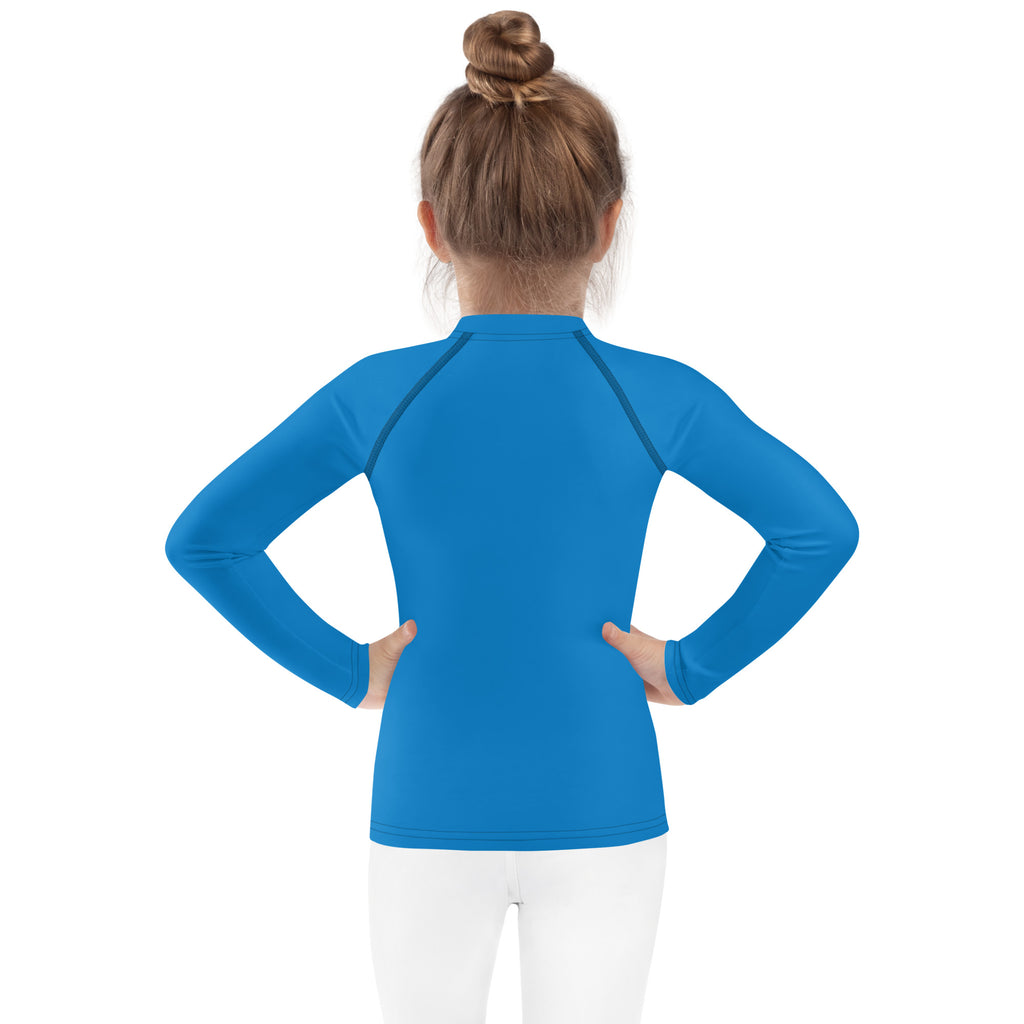 Kids navy blue long sleeve rash guard swim shirt with upf 50 plus and bright blue high collar raglan sleeves