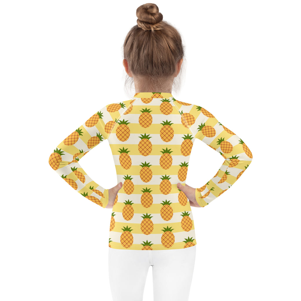 Kids yellow and white long sleeve rash guard swim shirt with pineapple pattern and upf 50 plus sun protection