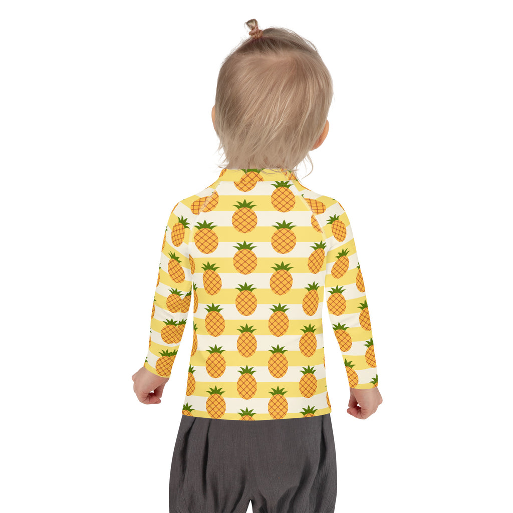 Kids yellow and white long-sleeved rash guard swim shirt with pineapple pattern and UPF 50 plus protection