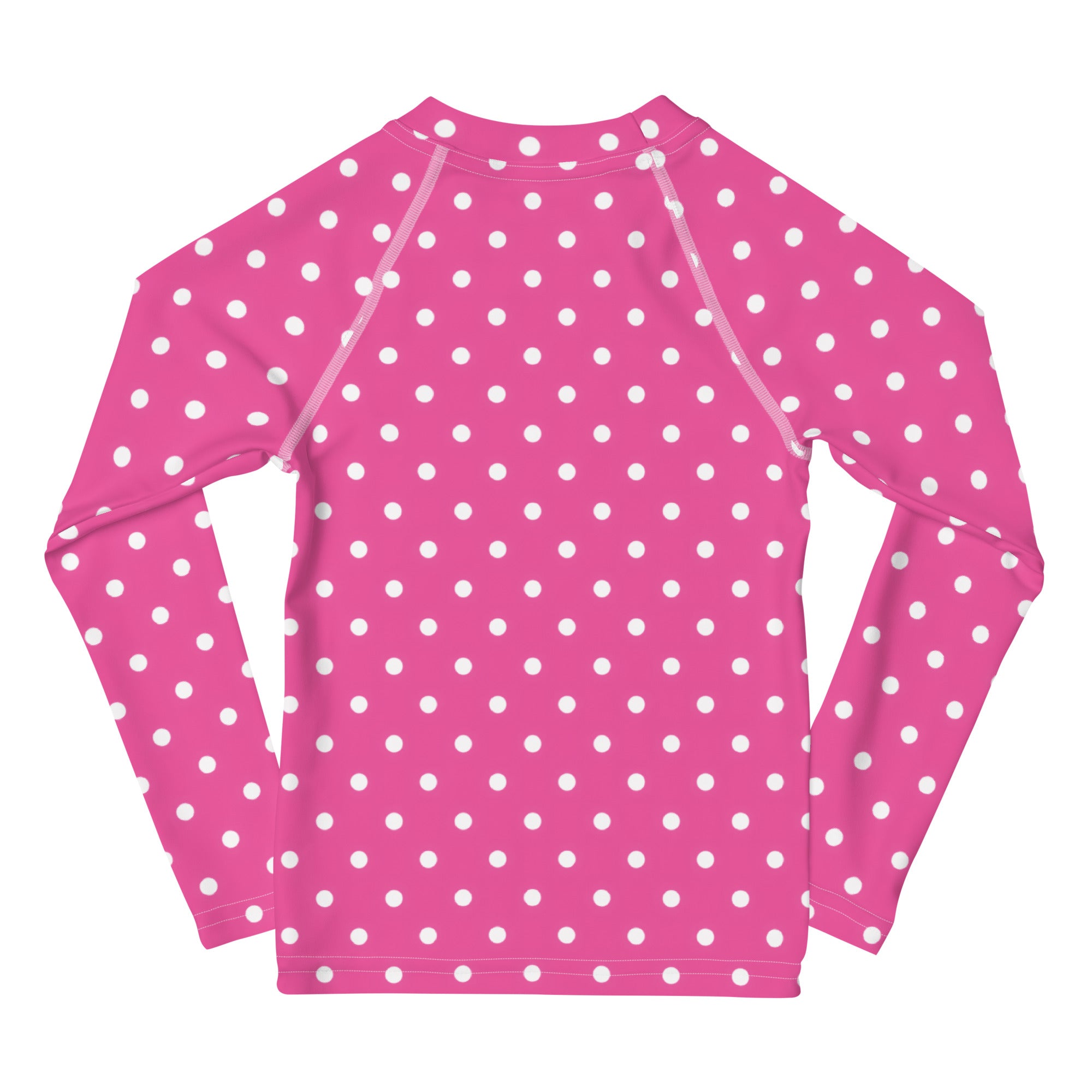 Girls pink long sleeve rash guard swim shirt with white polka dots and UPF 50 plus for sun protection
