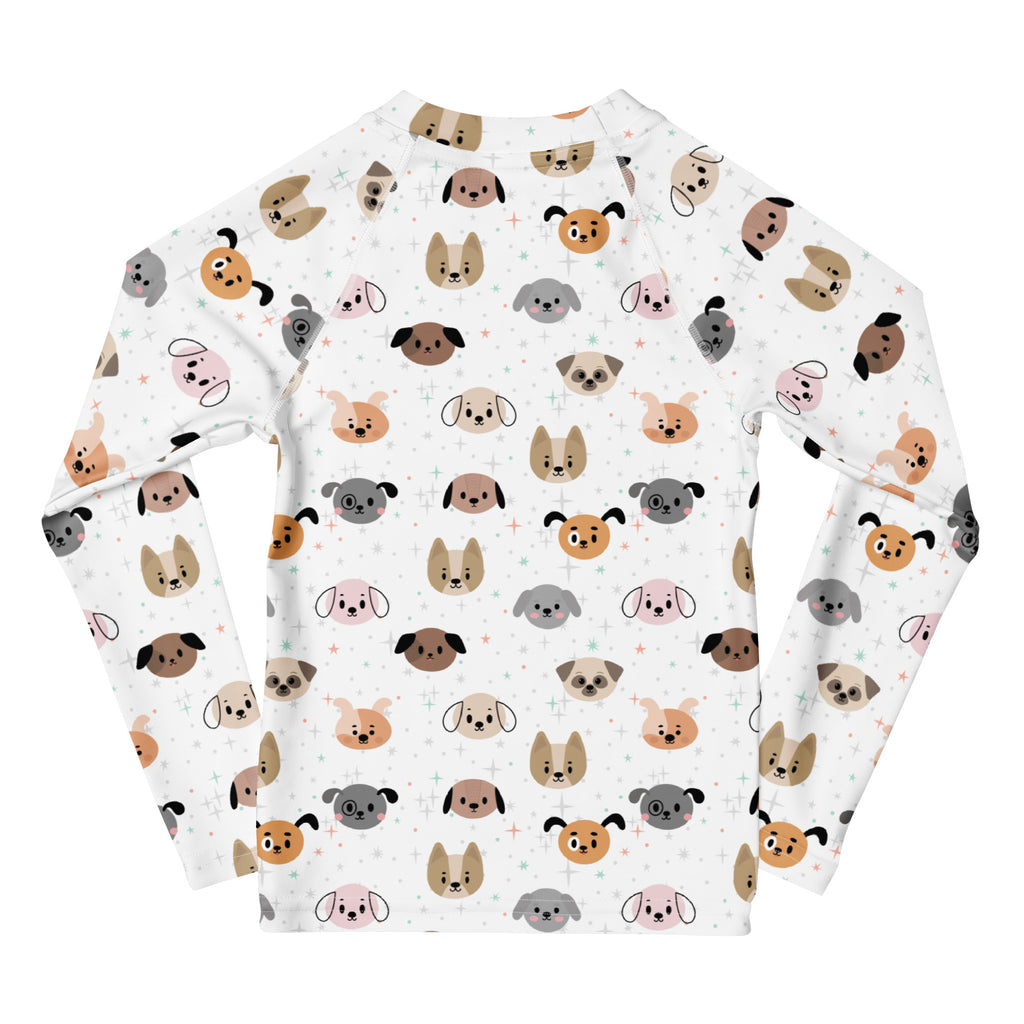 White long-sleeved rash guard swim shirt with colorful cartoon dog pattern and upf 50 plus sun protection