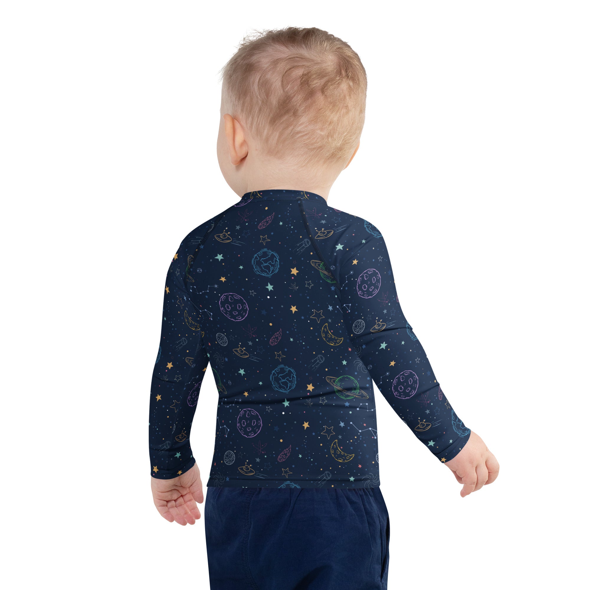 Navy blue long-sleeved baby rash guard swim shirt with pastel space-themed print and UPF 50 for sun protection