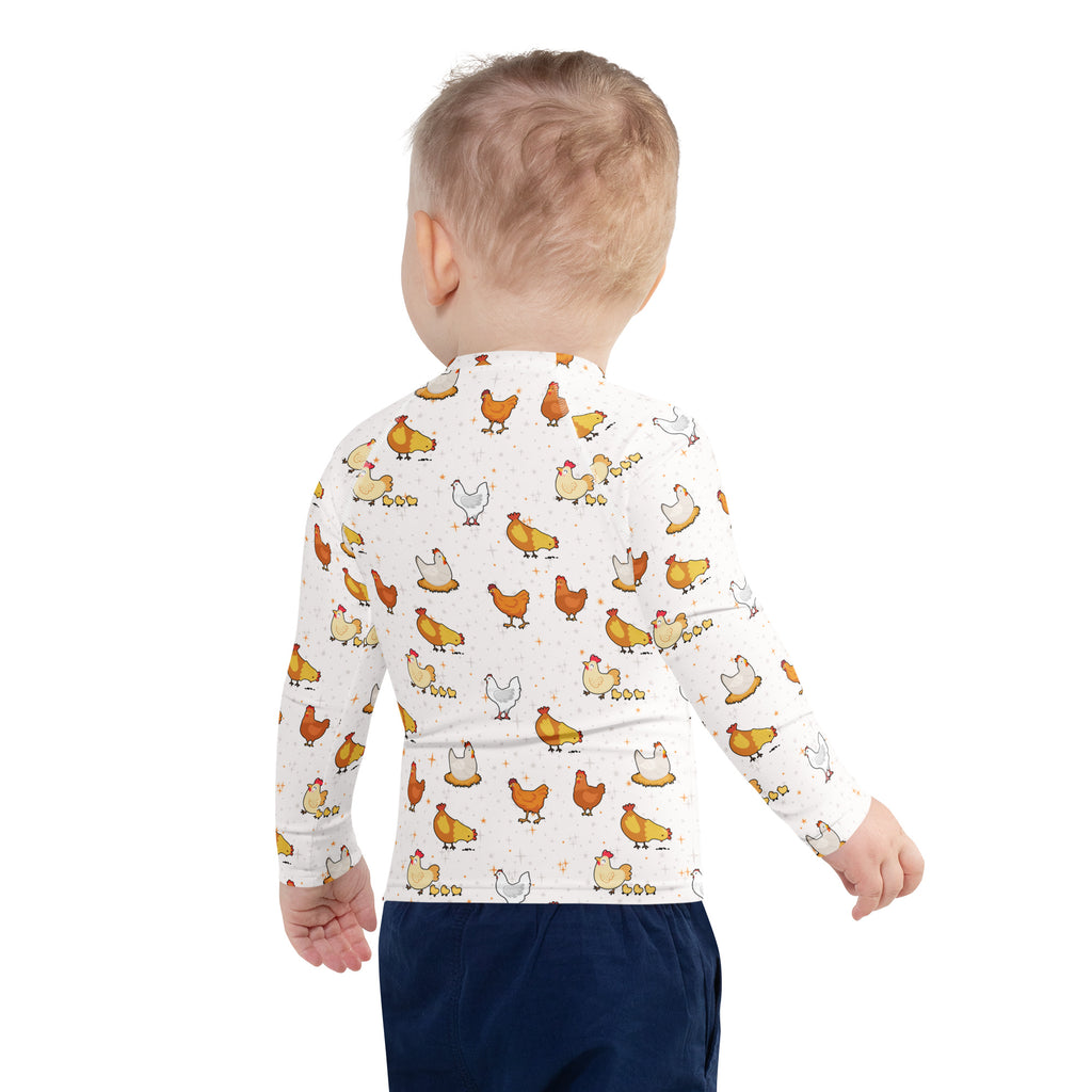White long-sleeve kids rash guard swim shirt with playful multicolor chicken pattern and upf 50 plus protection
