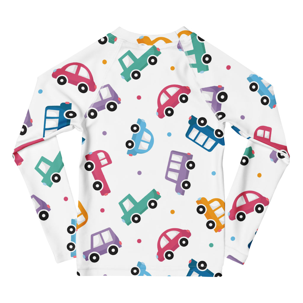 White long sleeve rash guard swim shirt with colorful cartoon cars in pink blue green purple and orange and upf 50+ protection