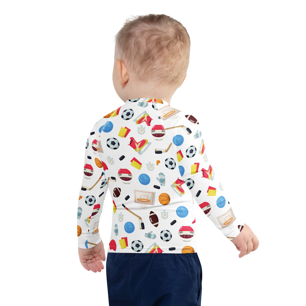 White long-sleeved kids sports rash guard swim shirt with colorful soccer basketball hockey pattern and upf 50 plus protection