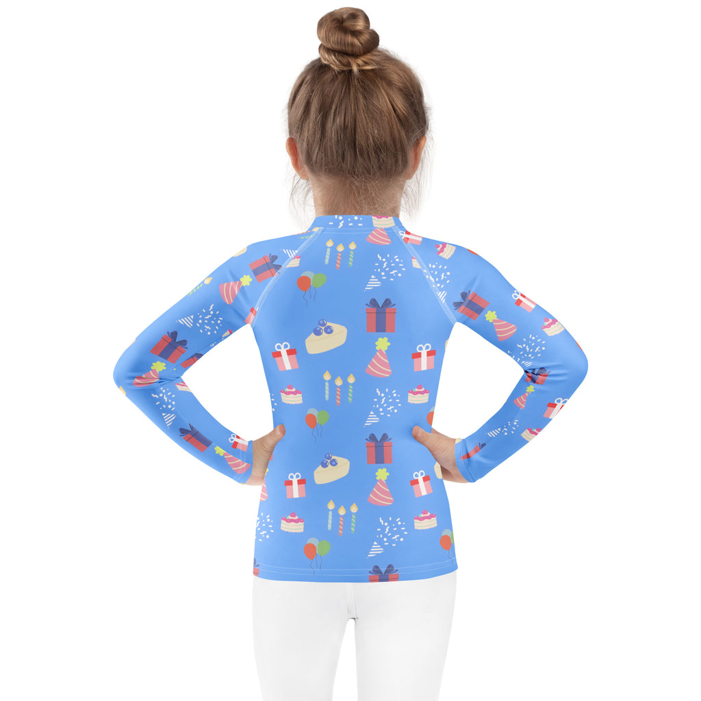 Kids blue long sleeve rash guard swim shirt with upf 50 plus featuring playful birthday gifts cakes candles and balloons pattern