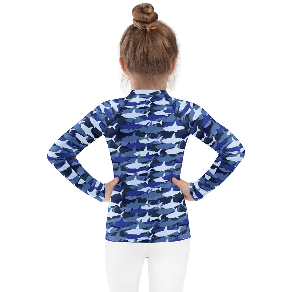 Kids blue shark long sleeve rash guard swim shirt with upf 50 plus featuring blue and white shark pattern