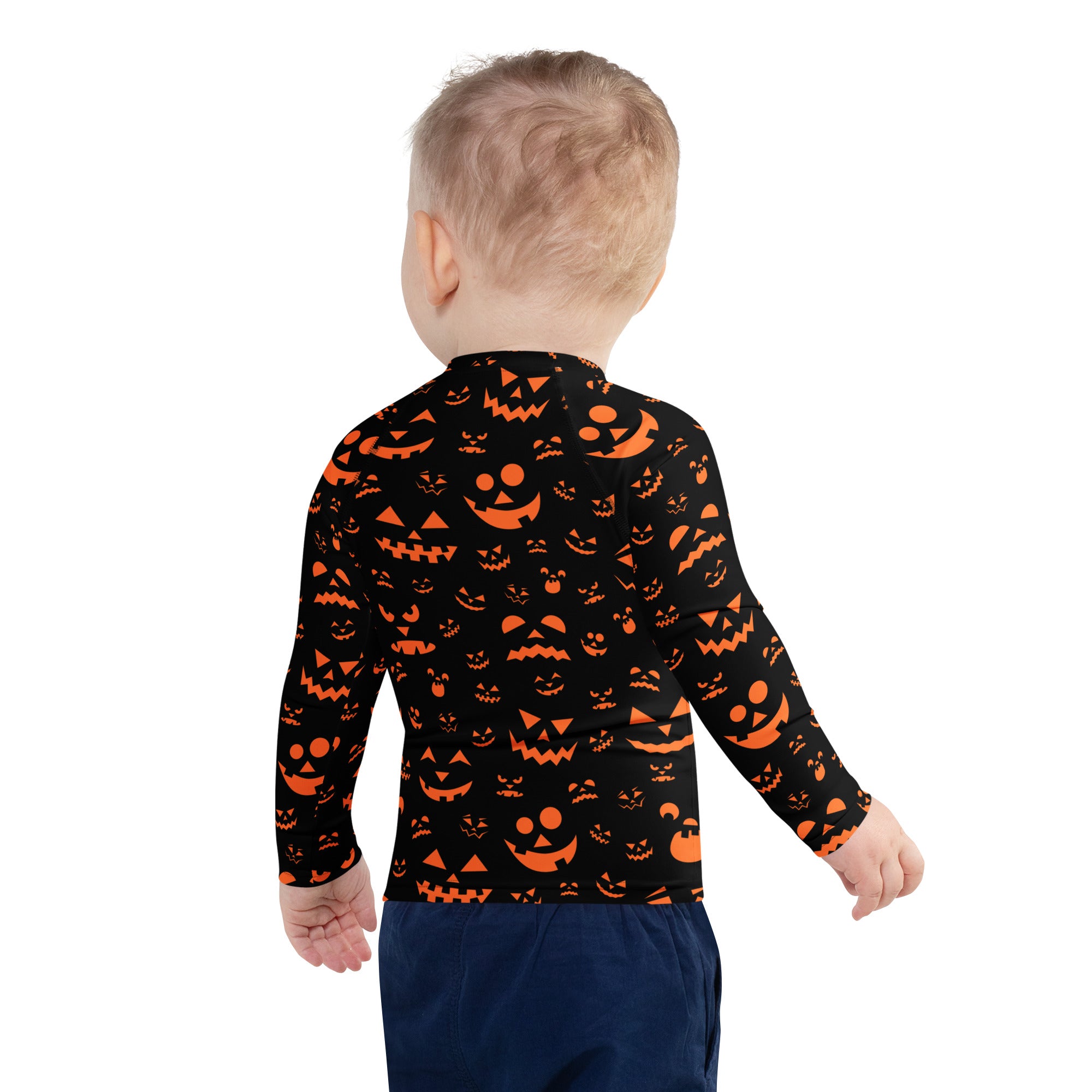 Kids orange jack o lantern faces halloween long sleeve rash guard swim shirt with upf 50 plus in black and orange